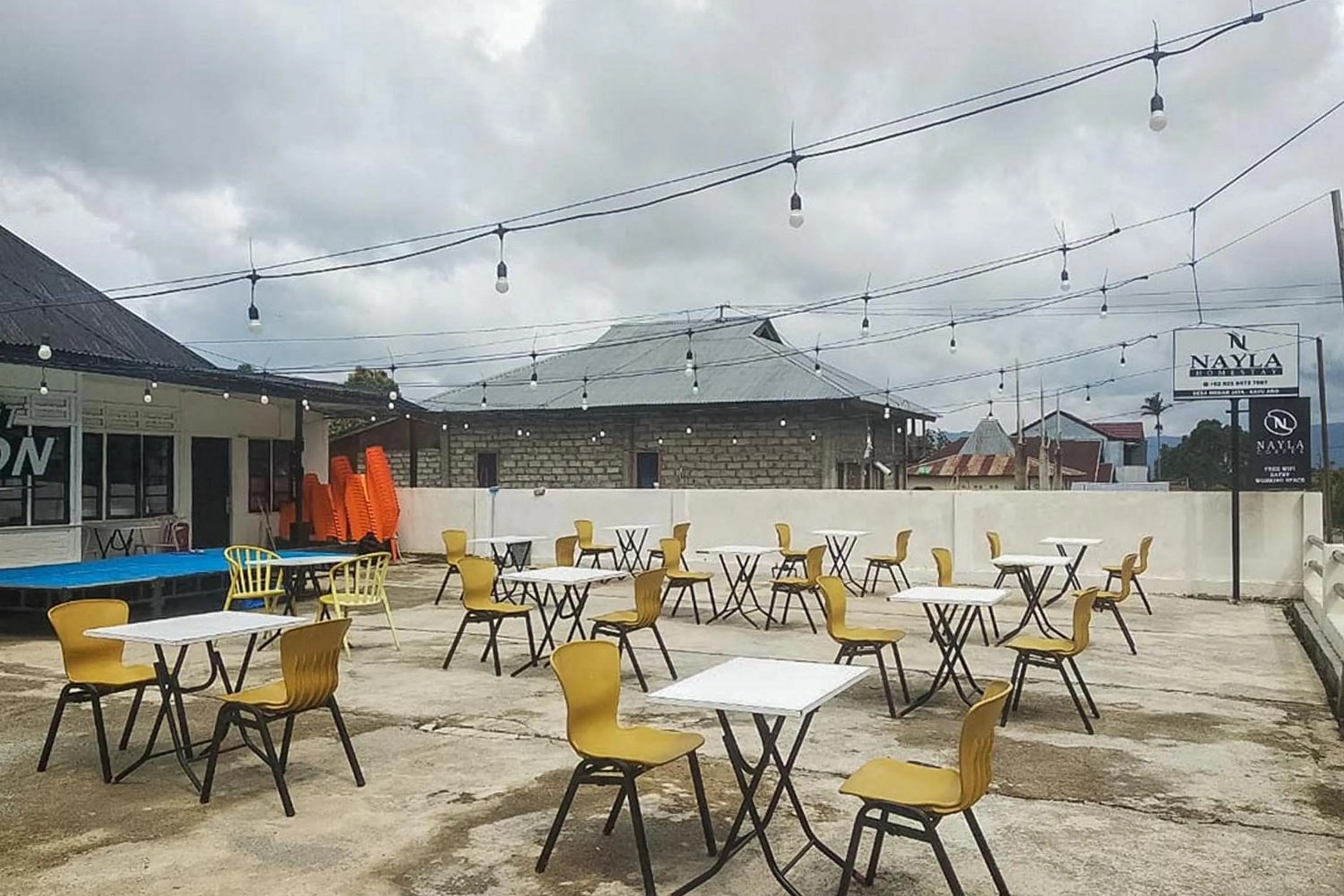 Facade/entrance in Nayla Homestay Jambi Mitra RedDoorz