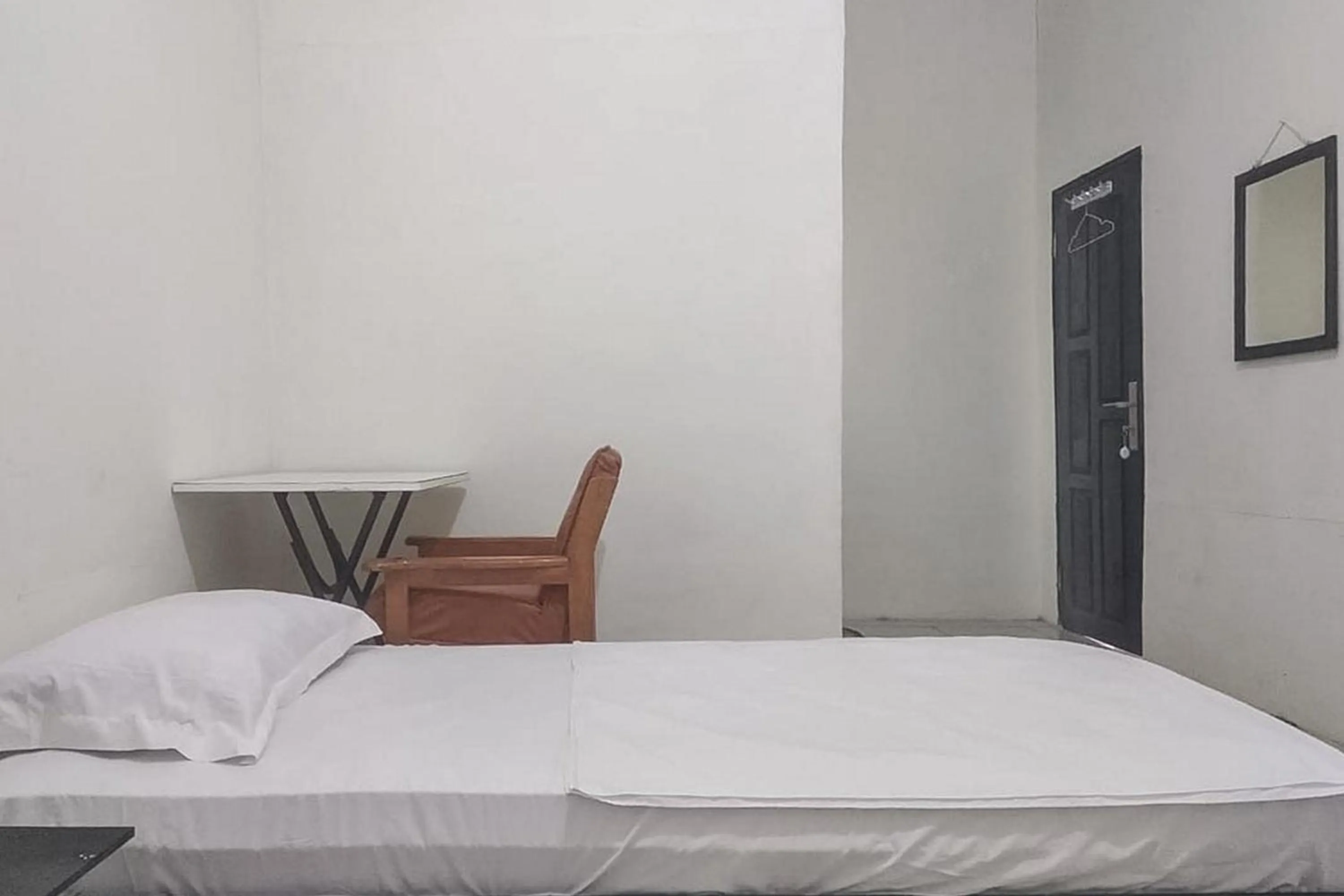 Bed in Nayla Homestay Jambi Mitra RedDoorz