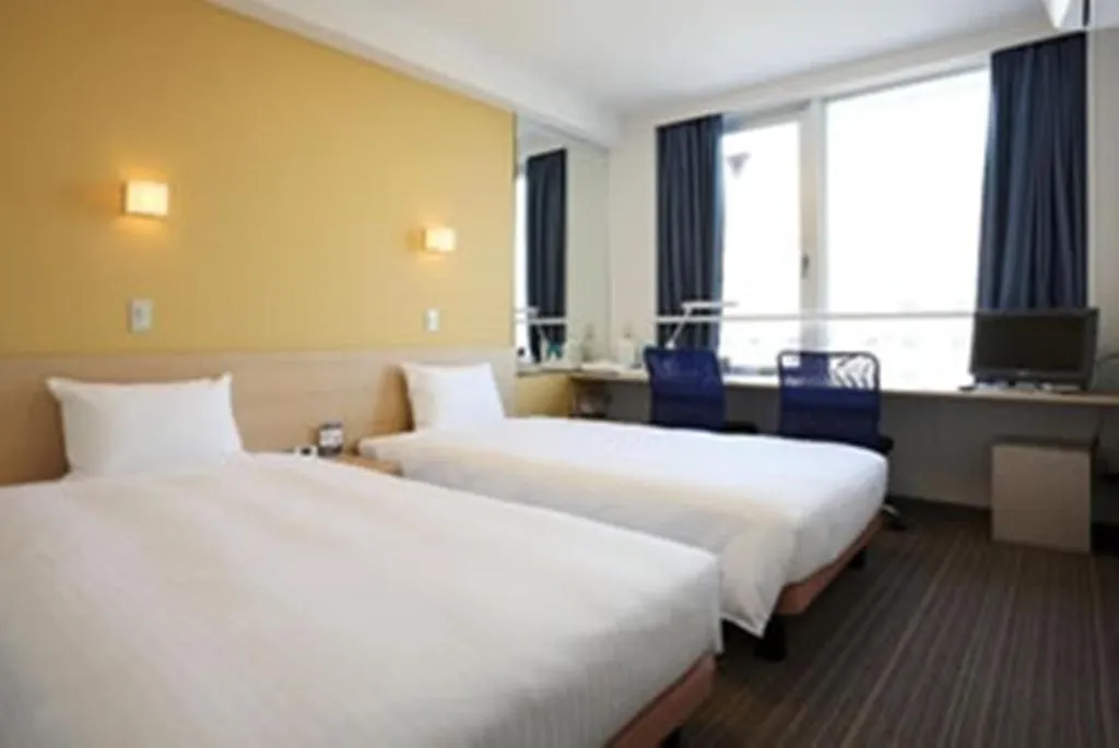 Bed in Smile Hotel Sendai Tagajyo