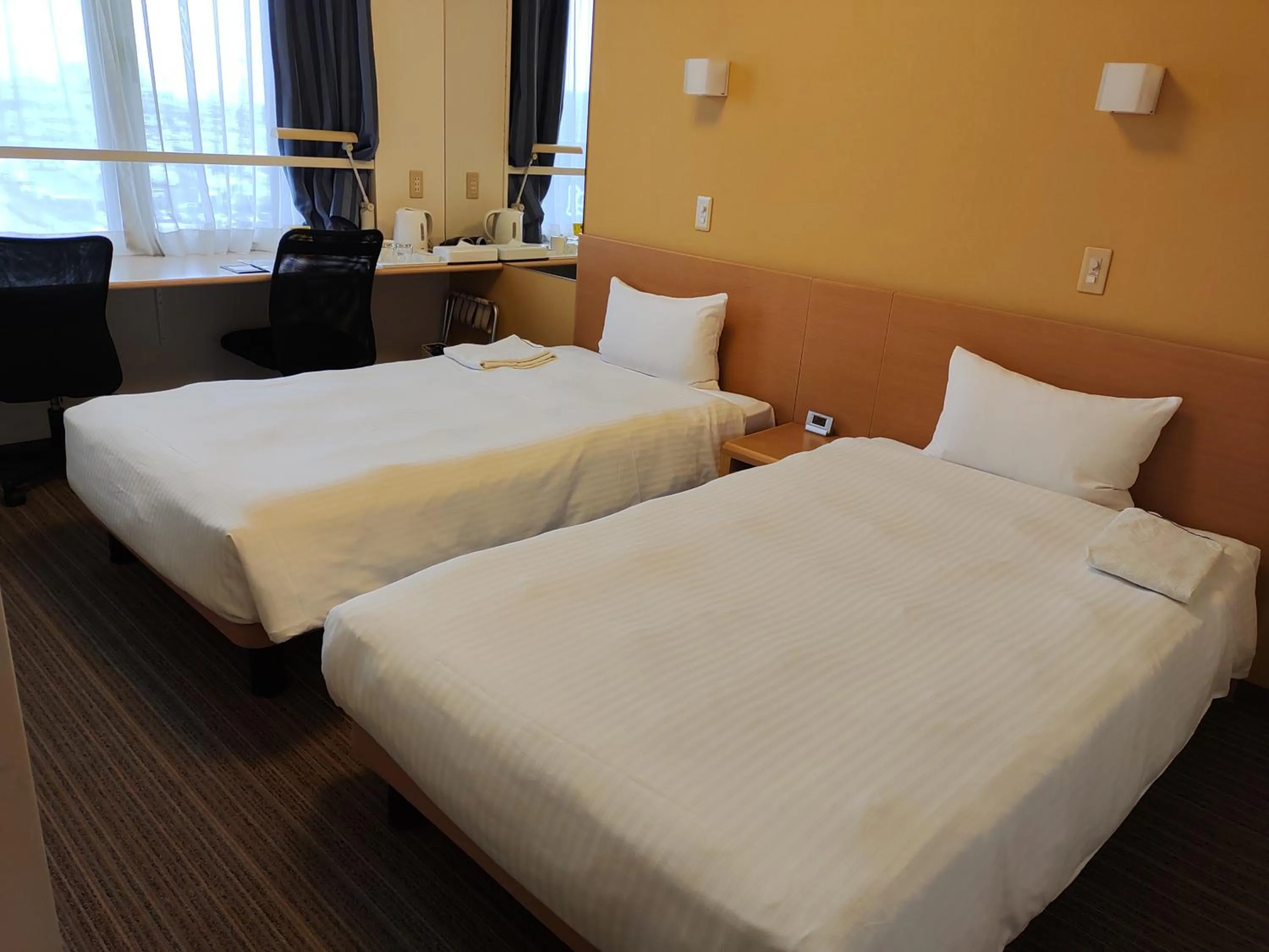 Bed in Smile Hotel Sendai Tagajyo