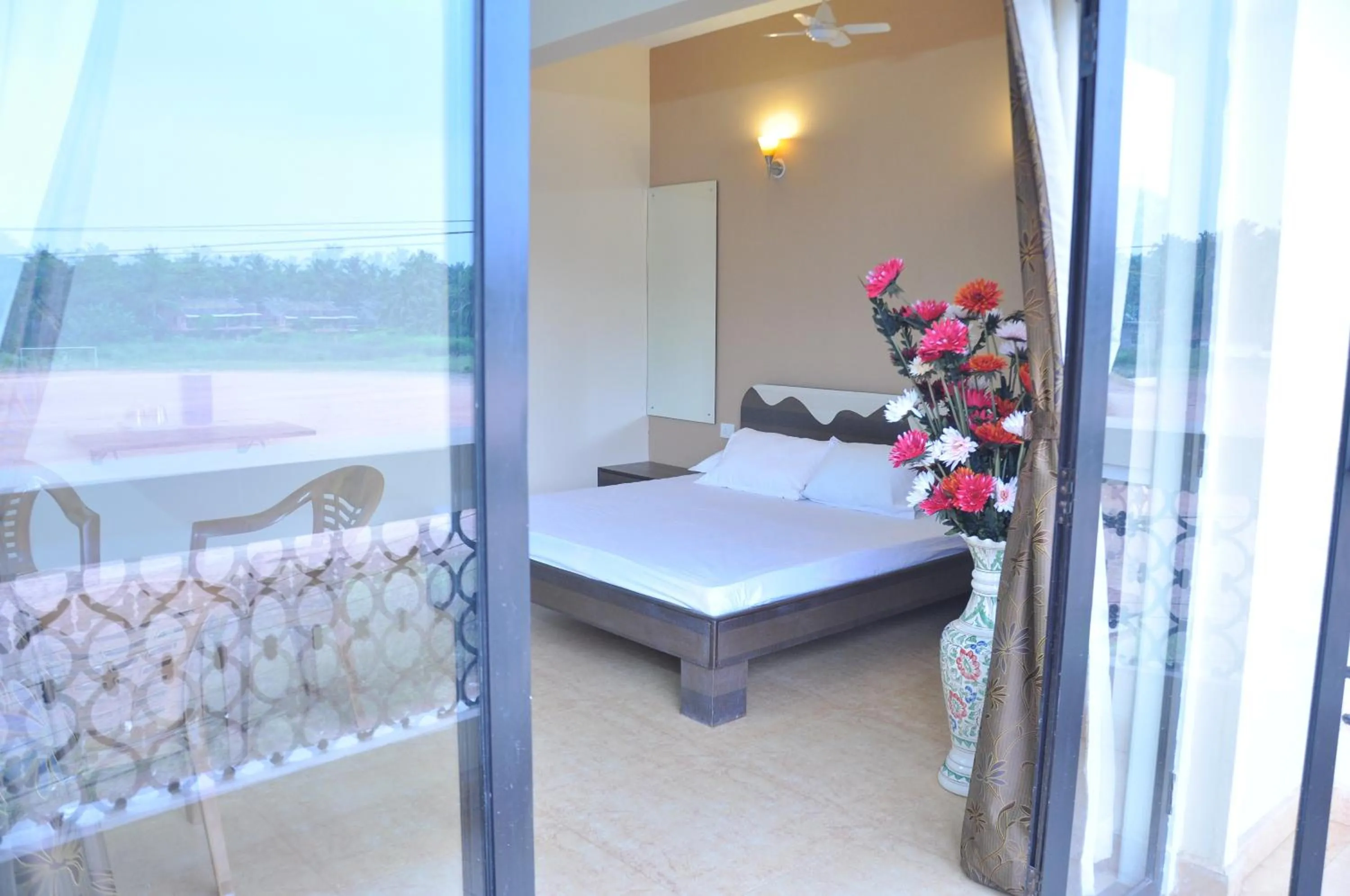 Bed in Ocean Crest Hotel