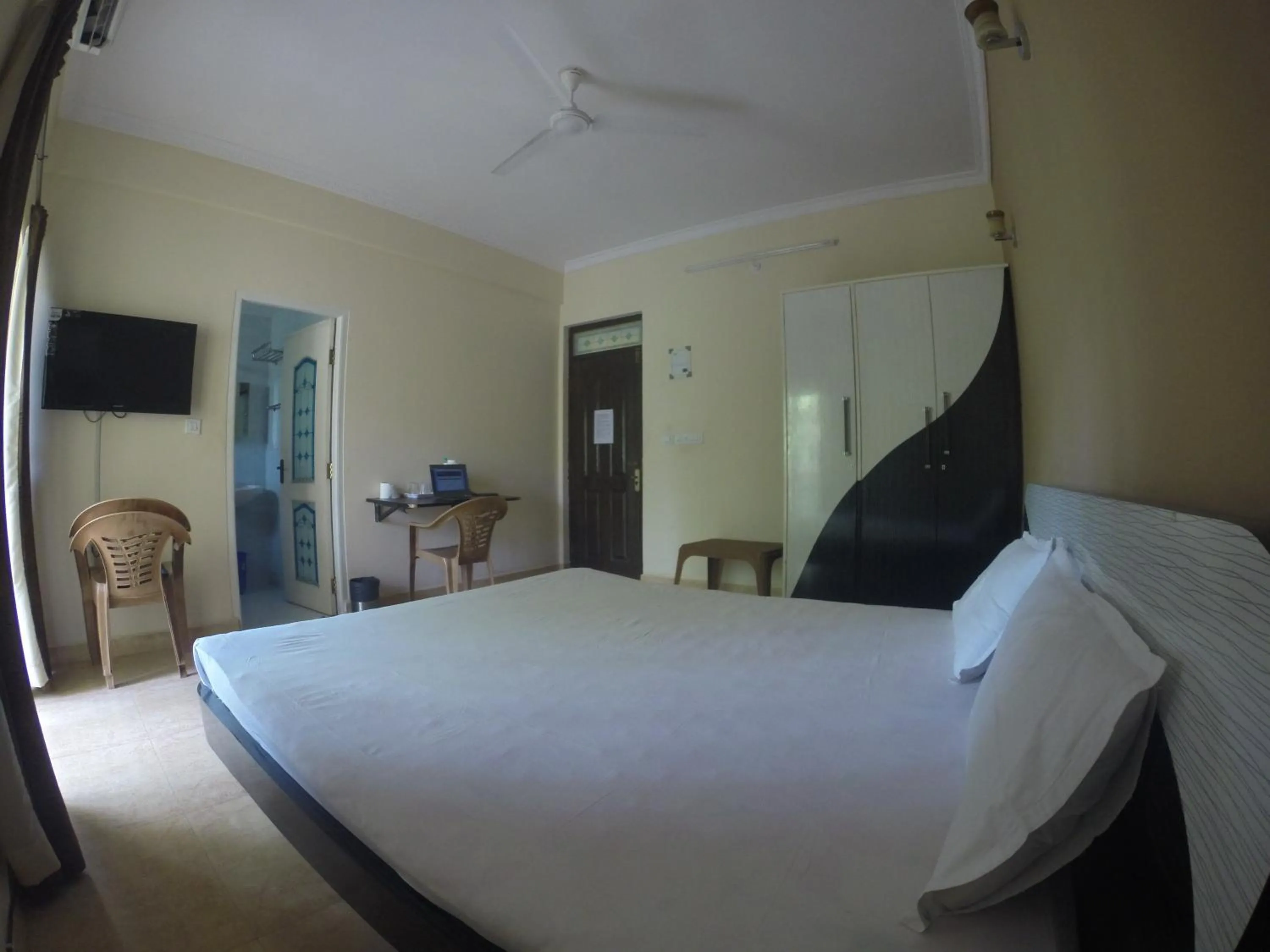 Bed in Ocean Crest Hotel