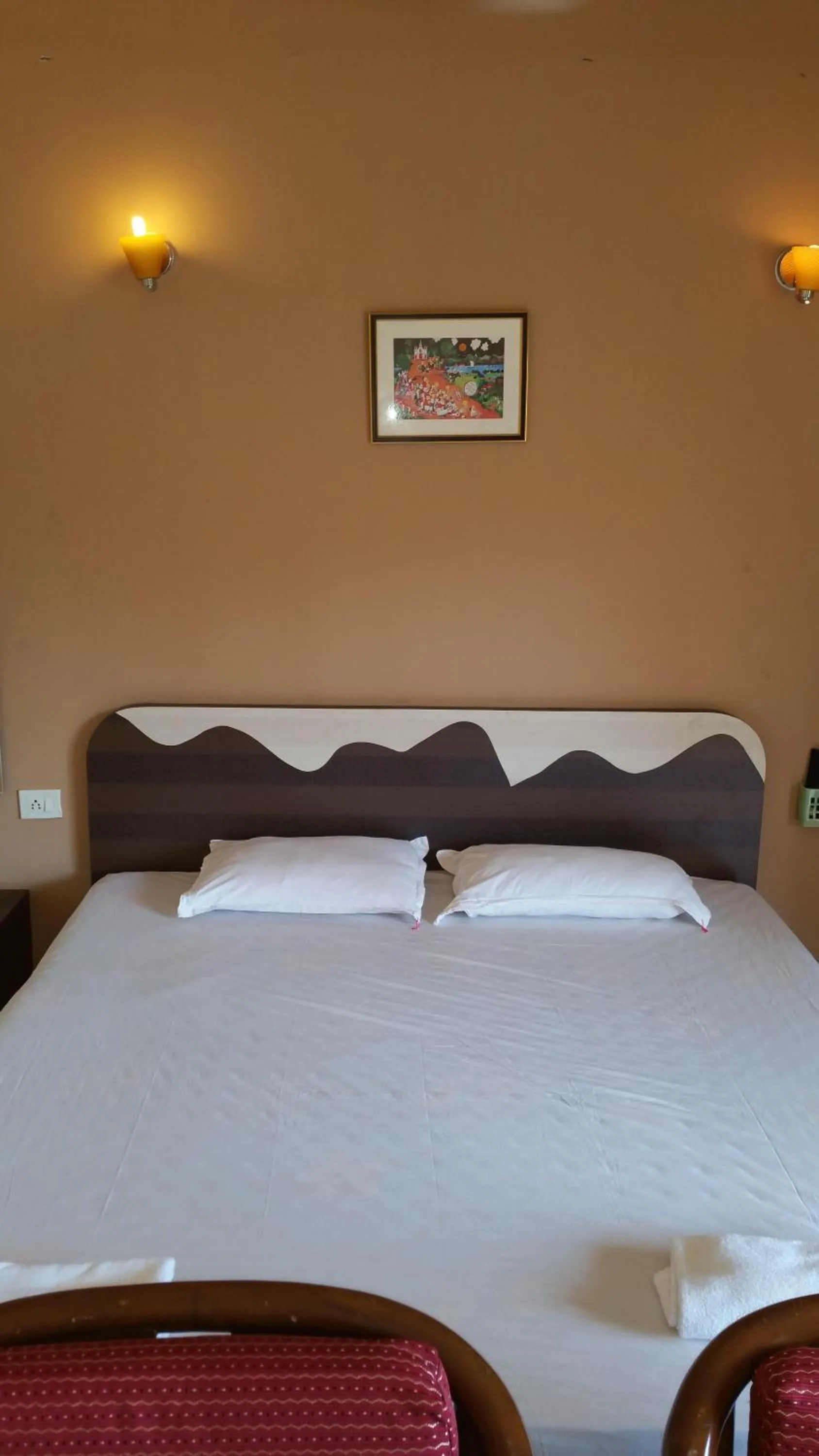Bed in Ocean Crest Hotel