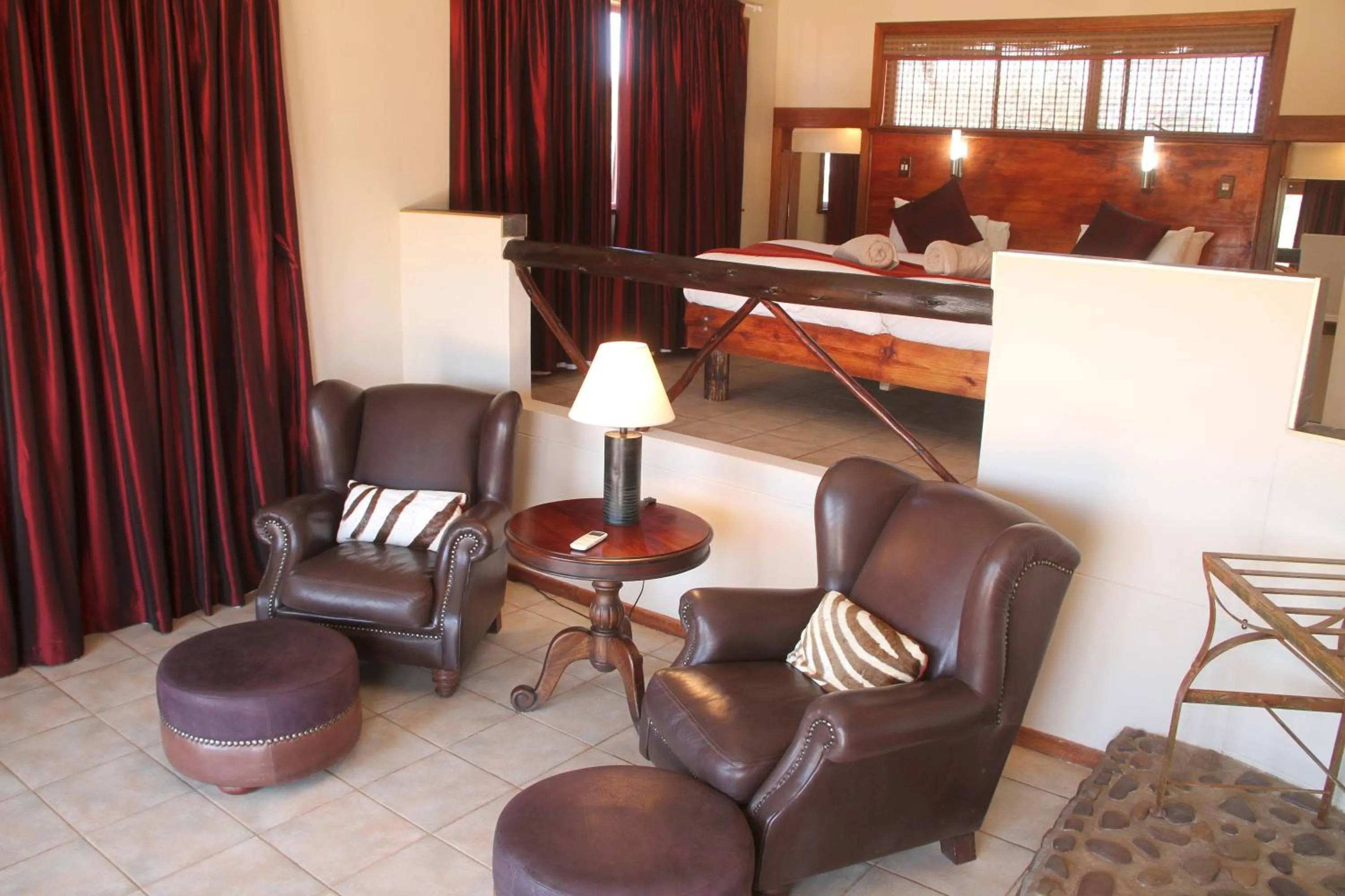 Bed in Zebra Kalahari Lodge