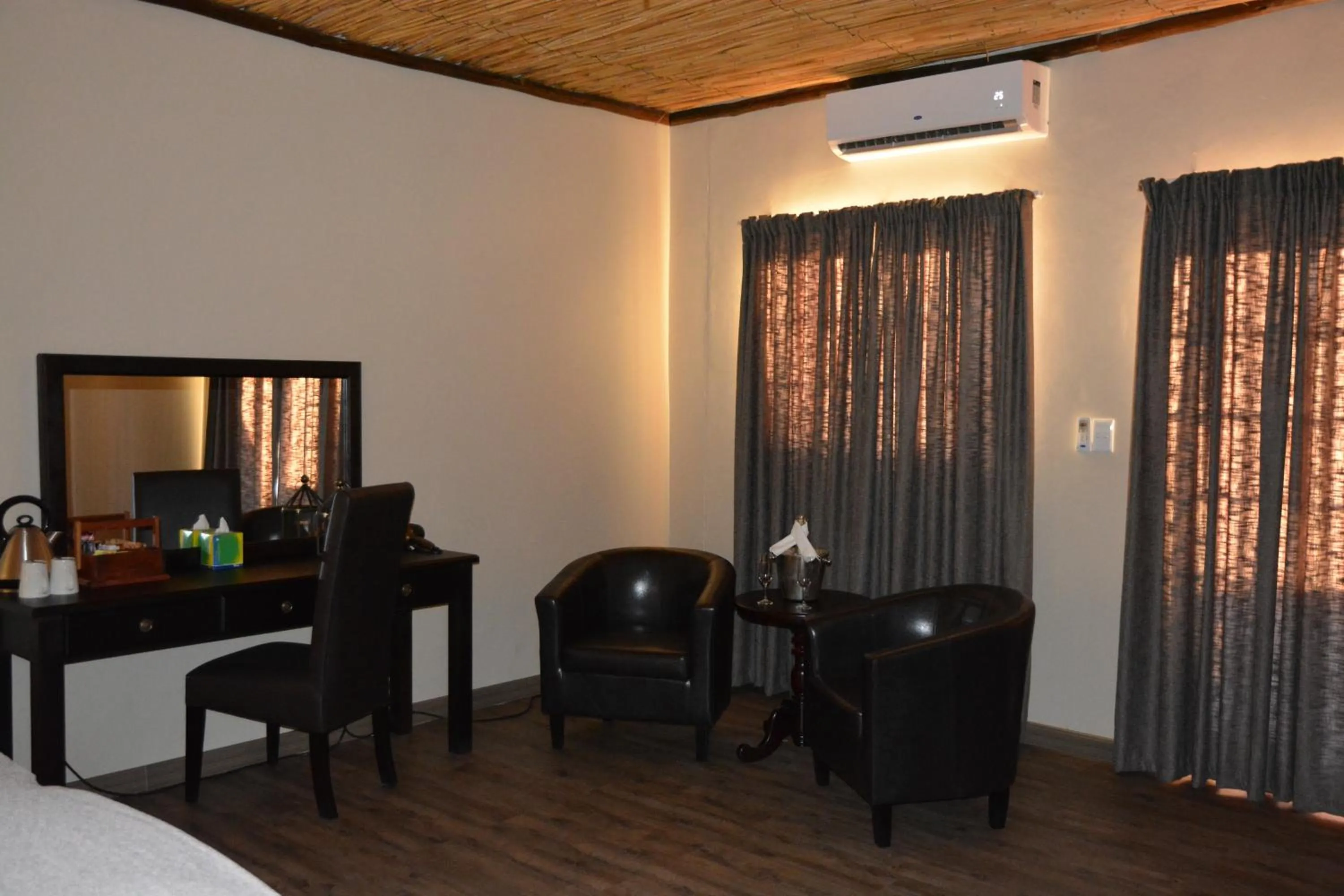 Bed in Zebra Kalahari Lodge