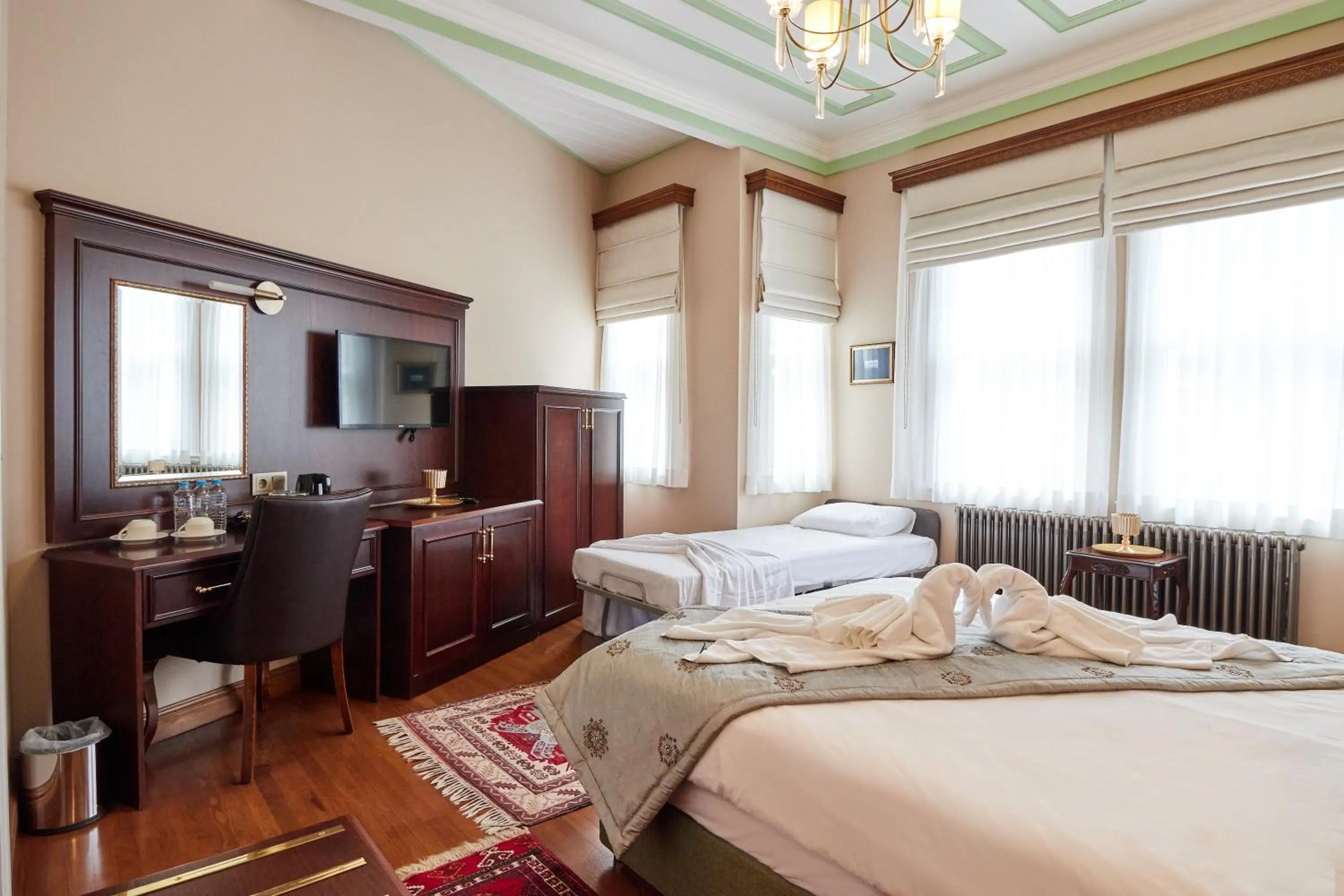 Bed in White Palace Old City Boutique Hotel