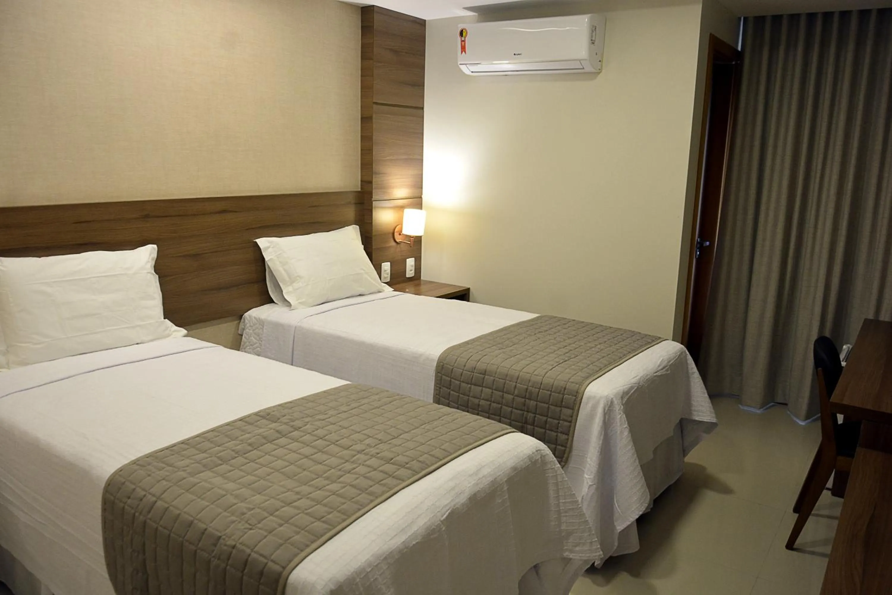 Bed in Pituba Praiamar Hotel