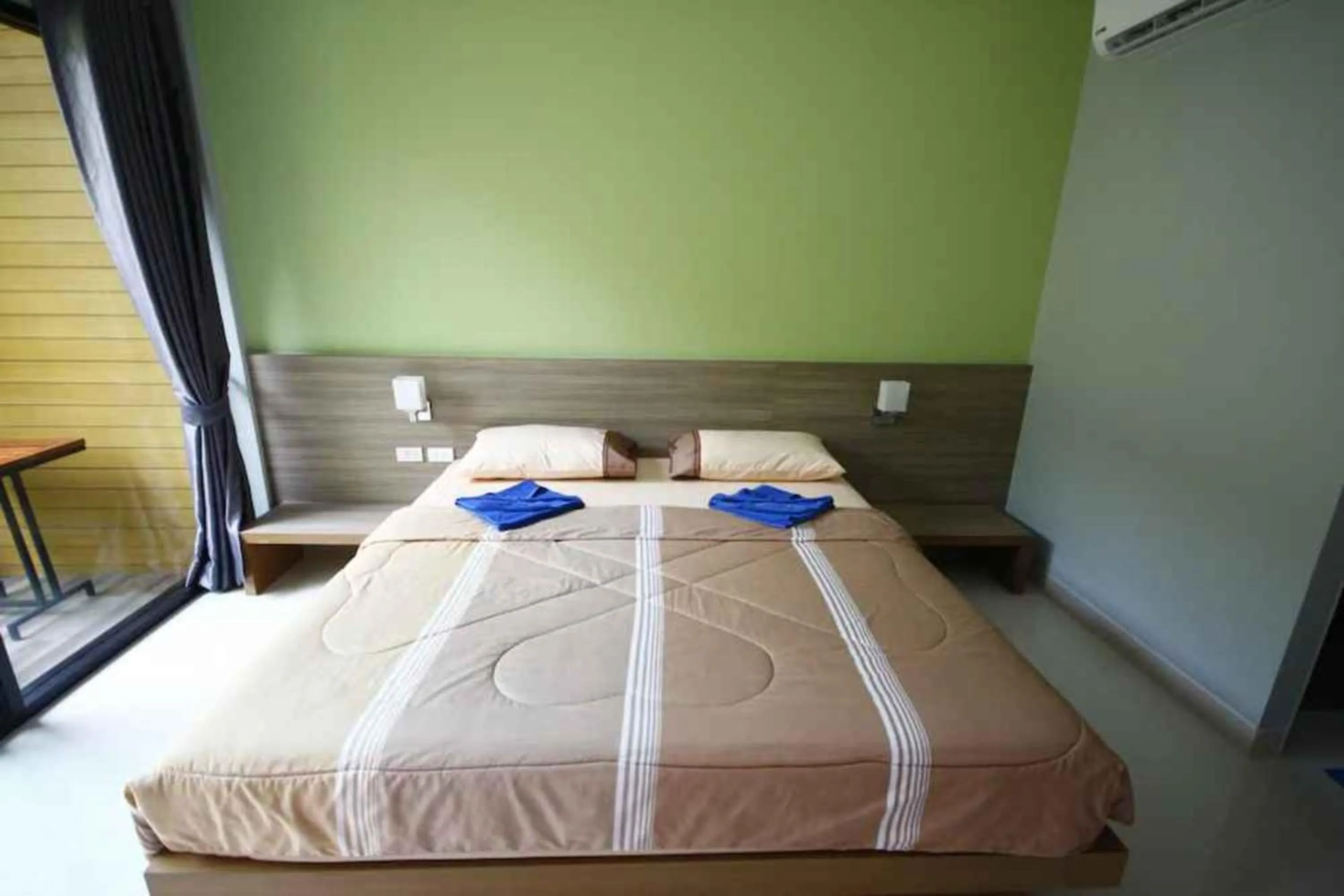 Photo of the whole room, Bed in Phumi Resort