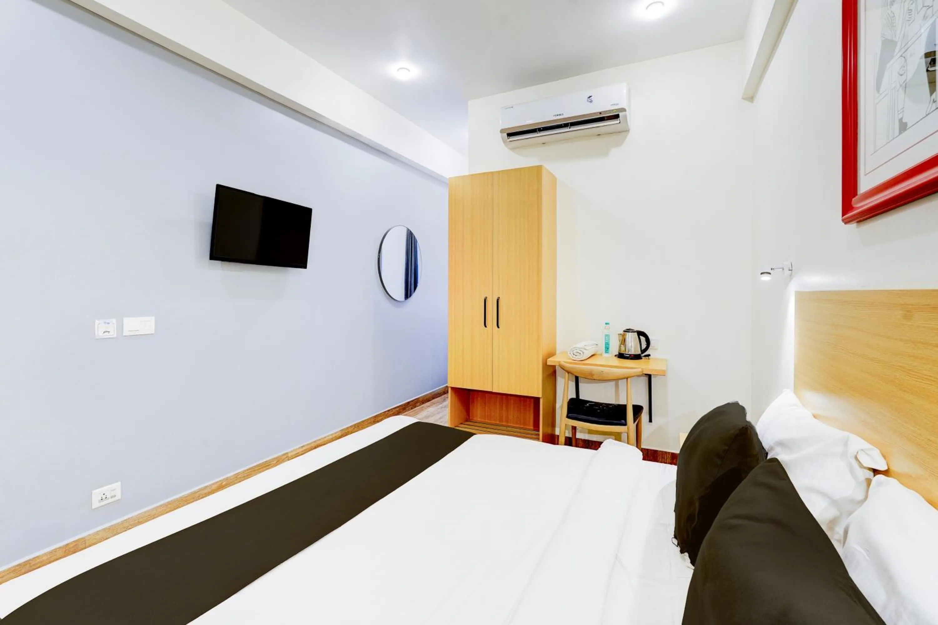 Bedroom, Bed in Super Townhouse Tirupati