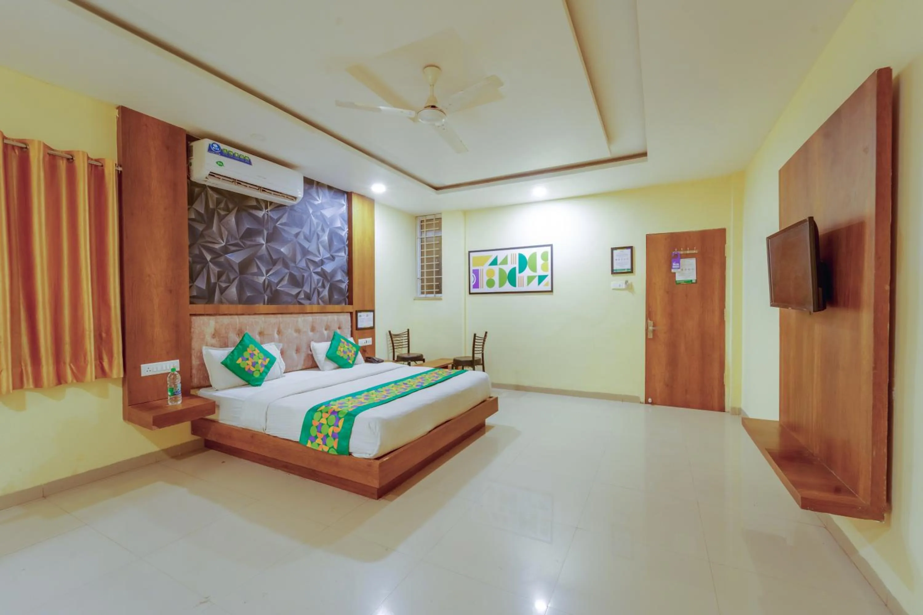 Bed in Treebo Royal Empire Indore