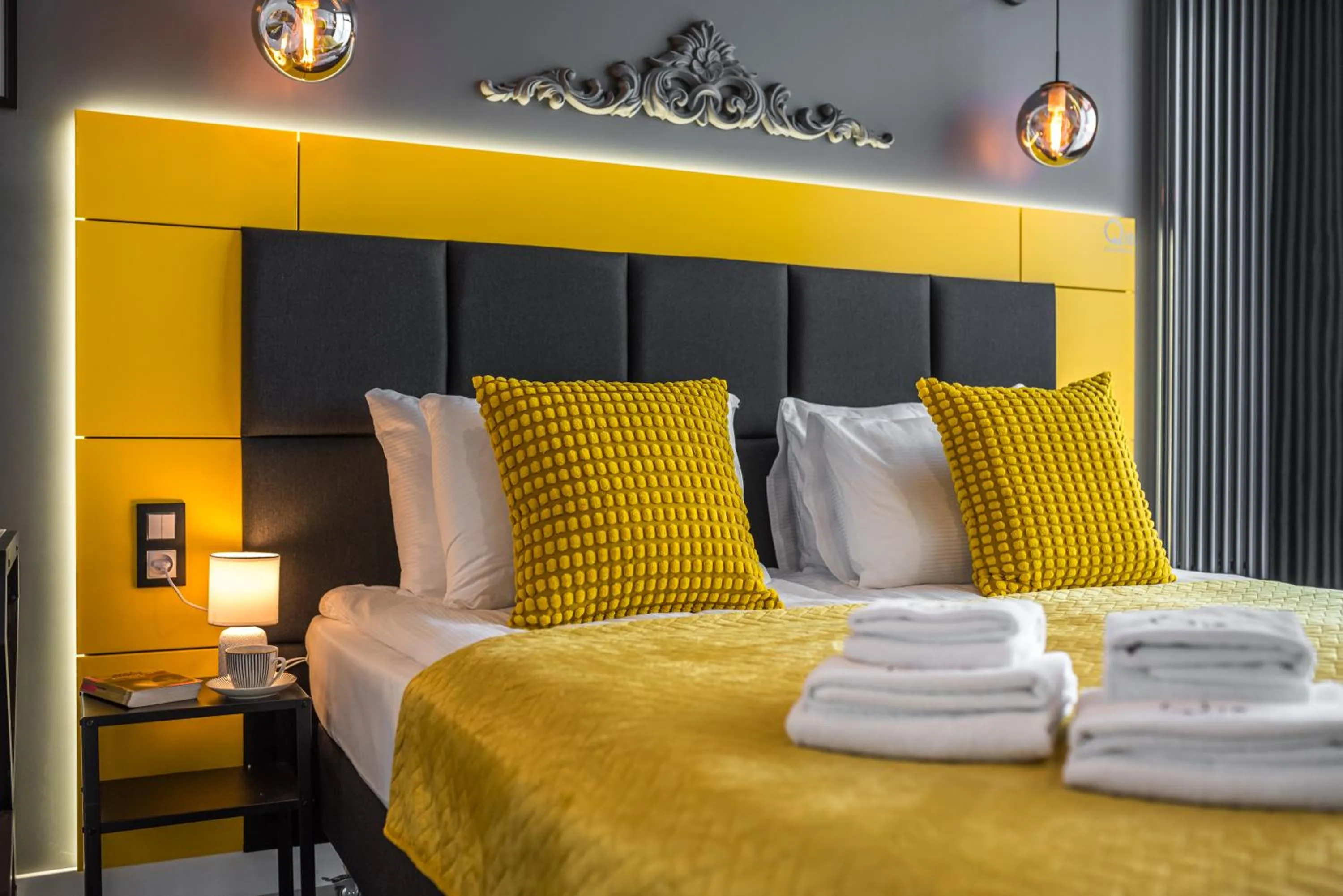 Bed in Q18 ApartHotel