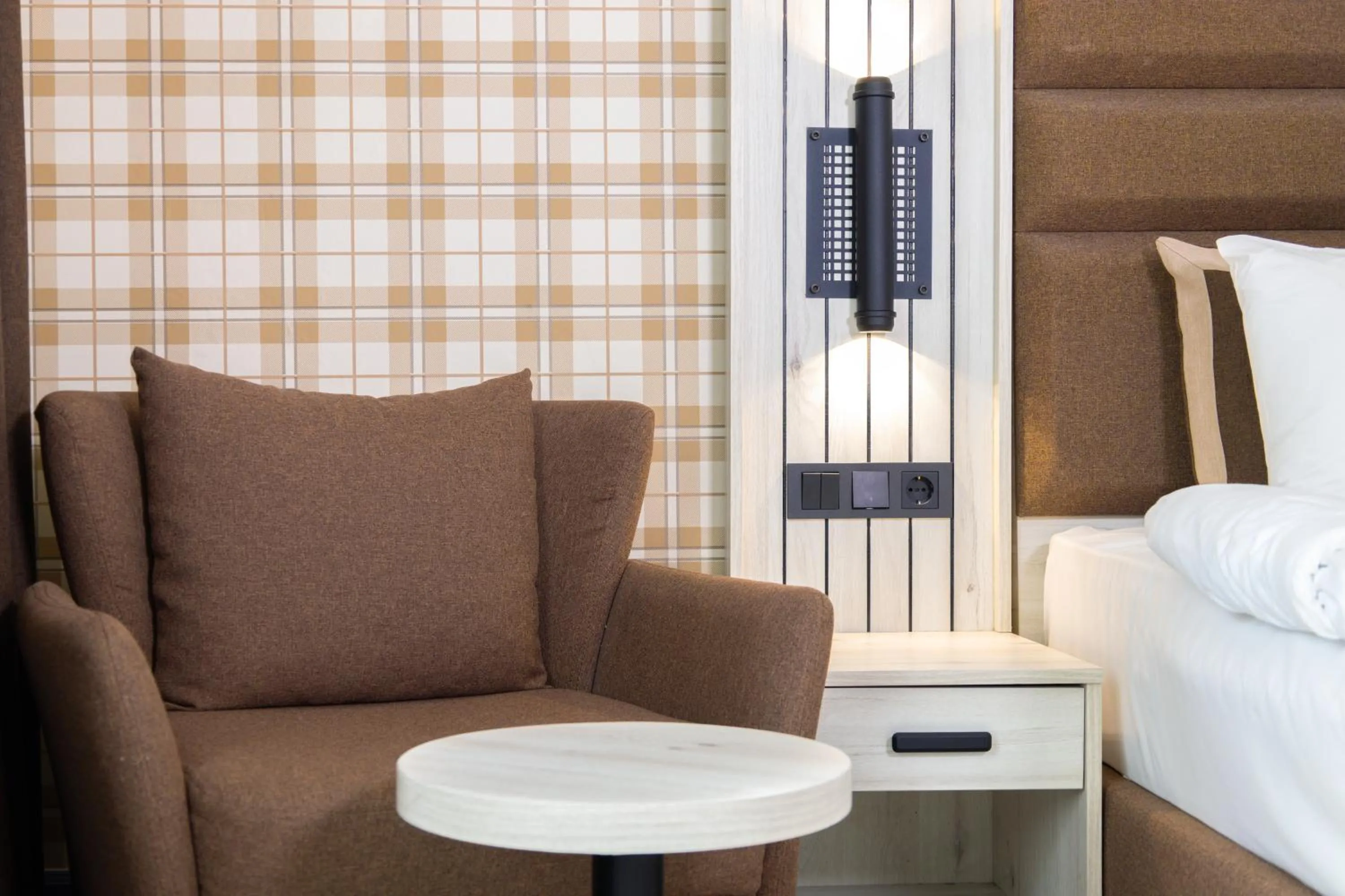 Living room, Bed in Hotel Innception