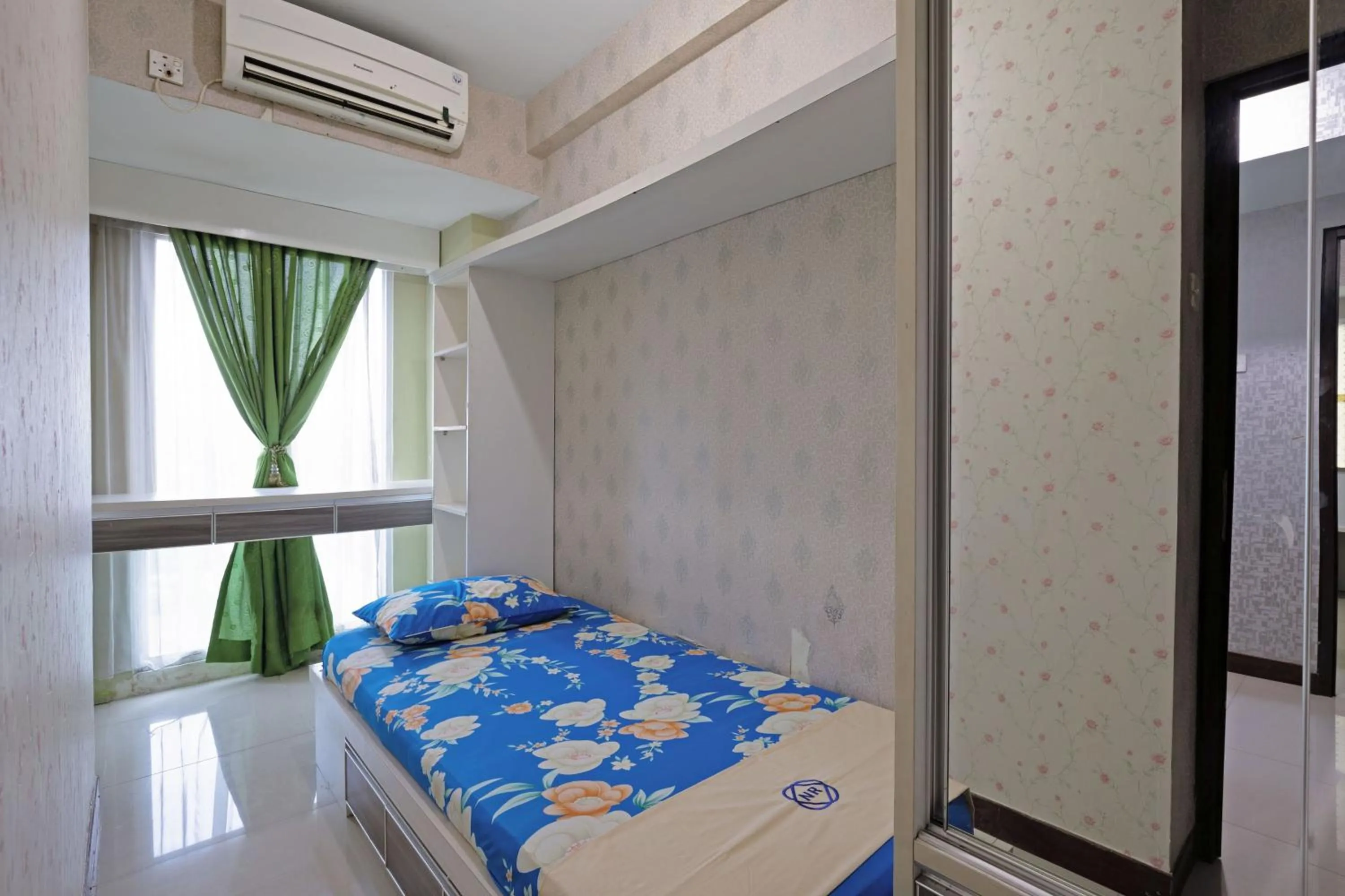 Bed in Apartemen Grand Dhika City by Nina