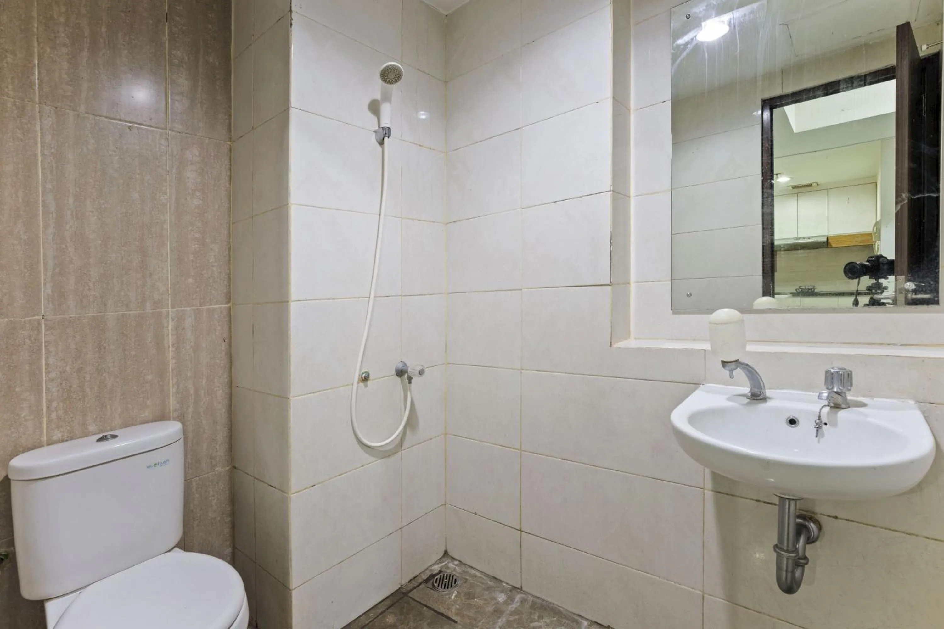 Bathroom in Apartemen Grand Dhika City by Nina