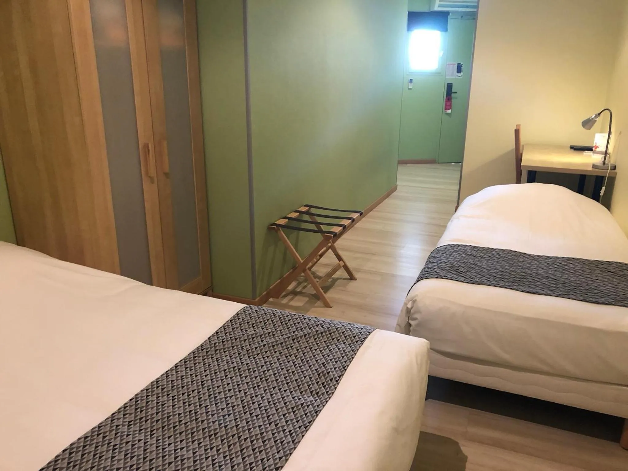 Bed in In Jungle Hôtel