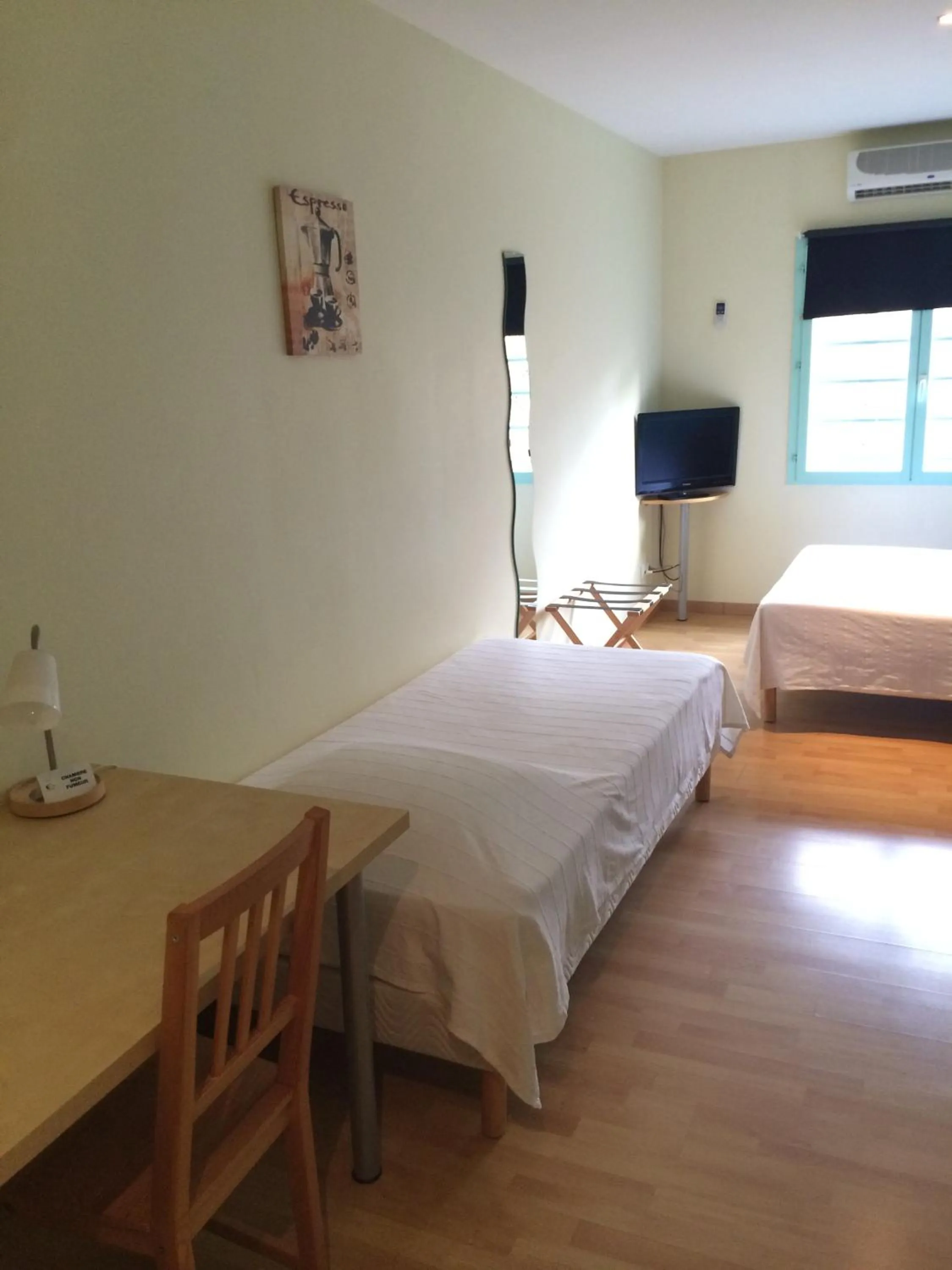 Bed in In Jungle Hôtel