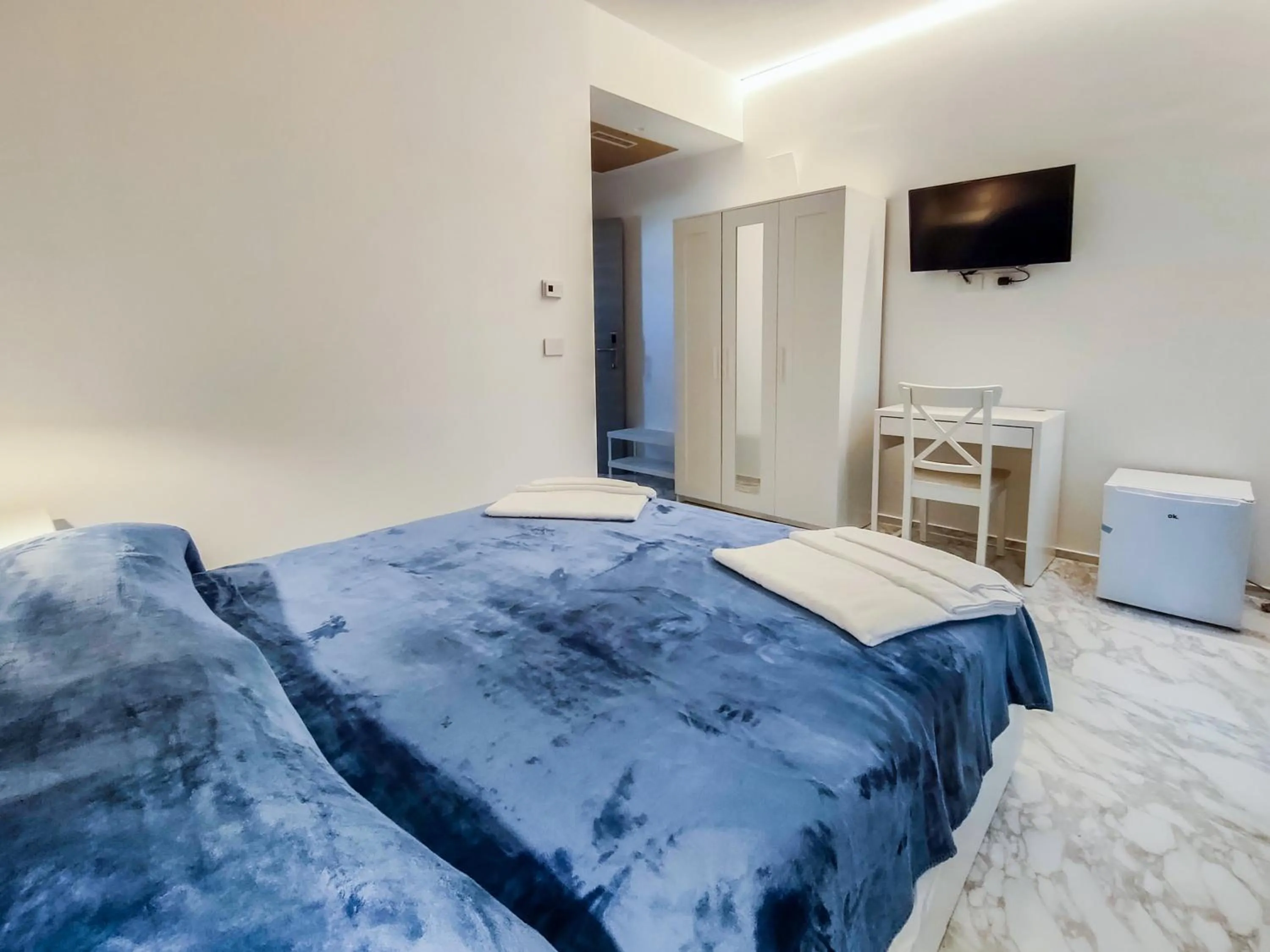 Bed in Cubacalatafimi Rooms