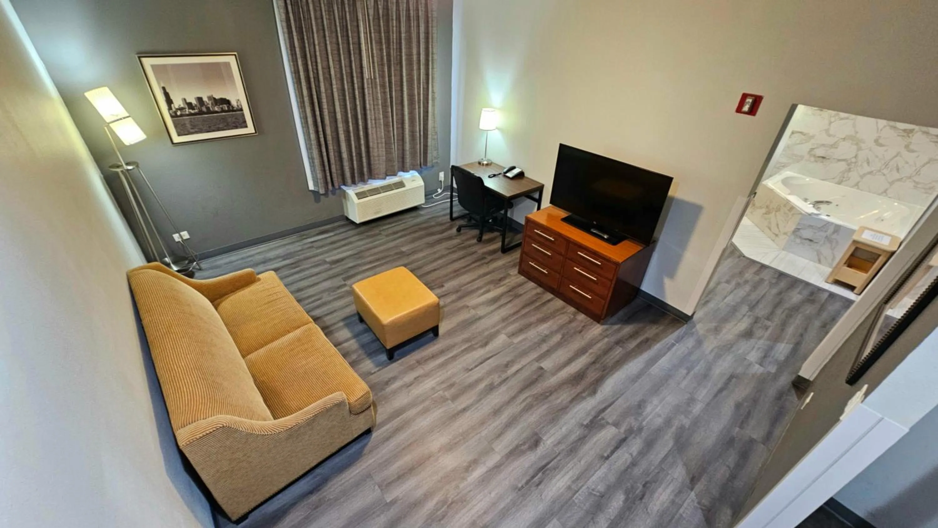 Living room in Baymont by Wyndham Chicago/Calumet City