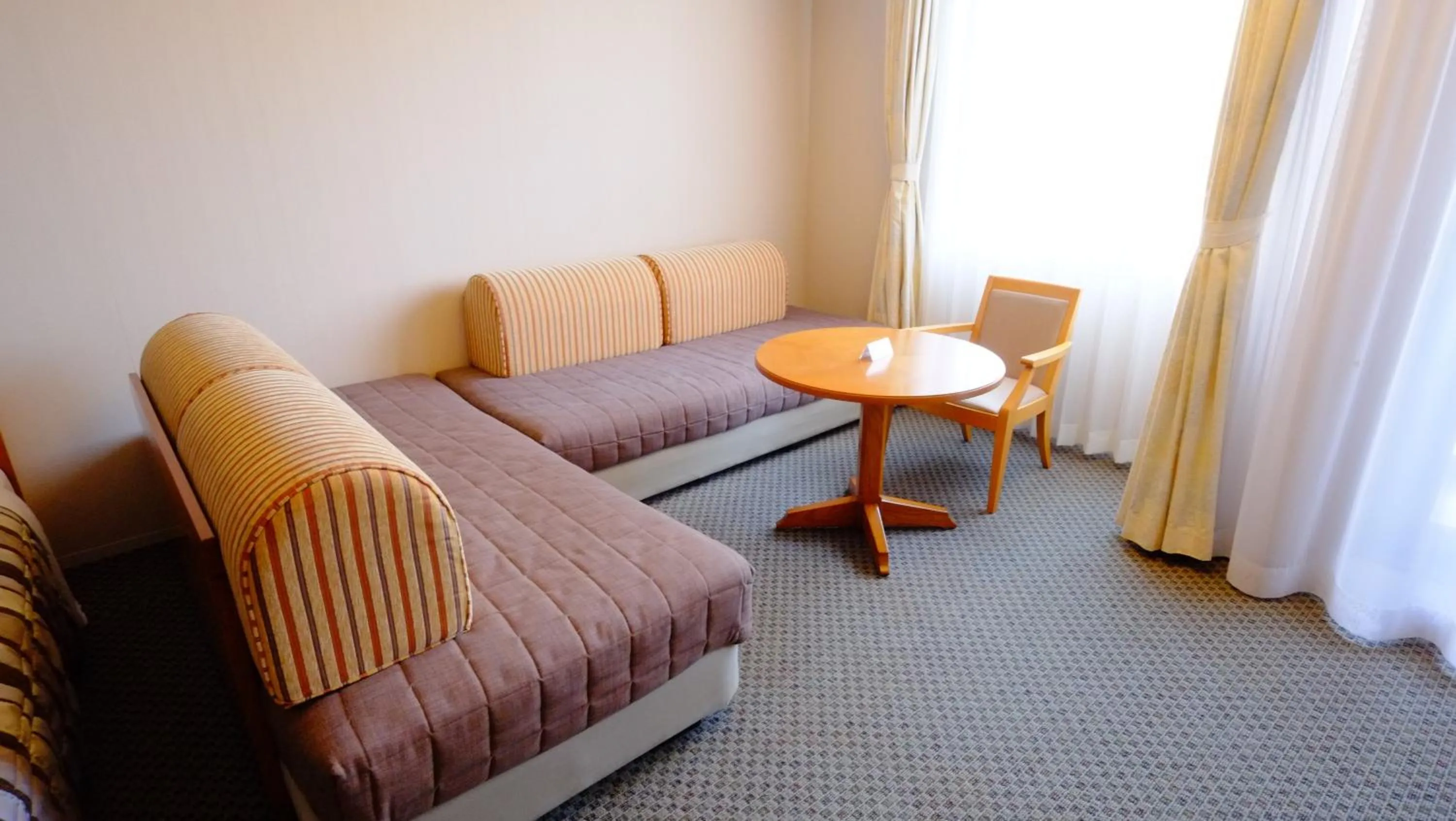 Seating area in Hotel Harvest Skijam Katsuyama