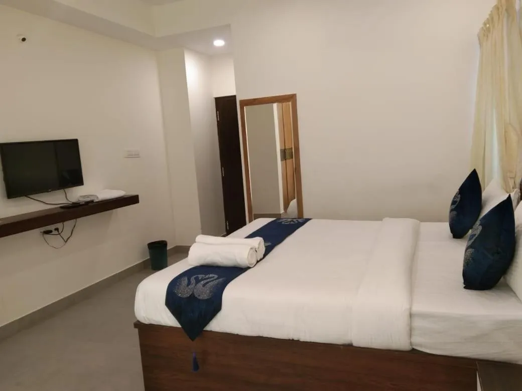 Bed in Hotel Amulya Fine Dine