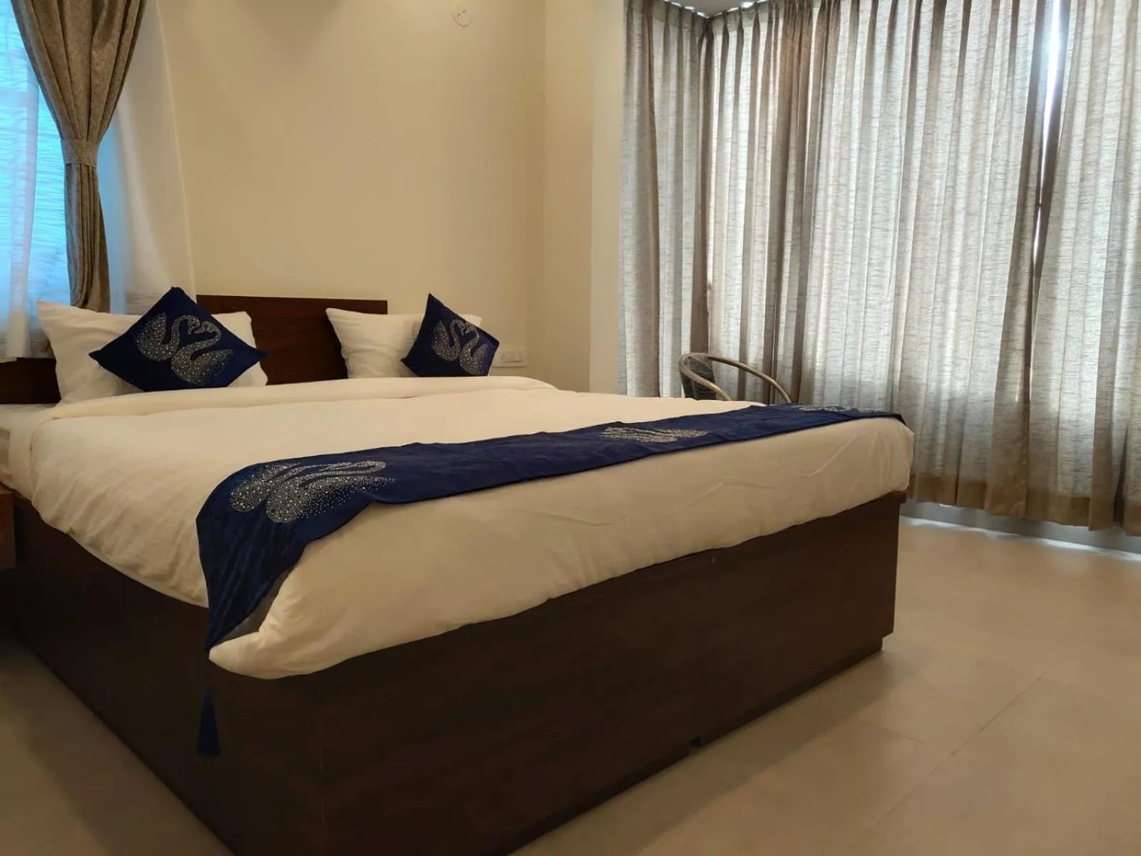 Bed in Hotel Amulya Fine Dine