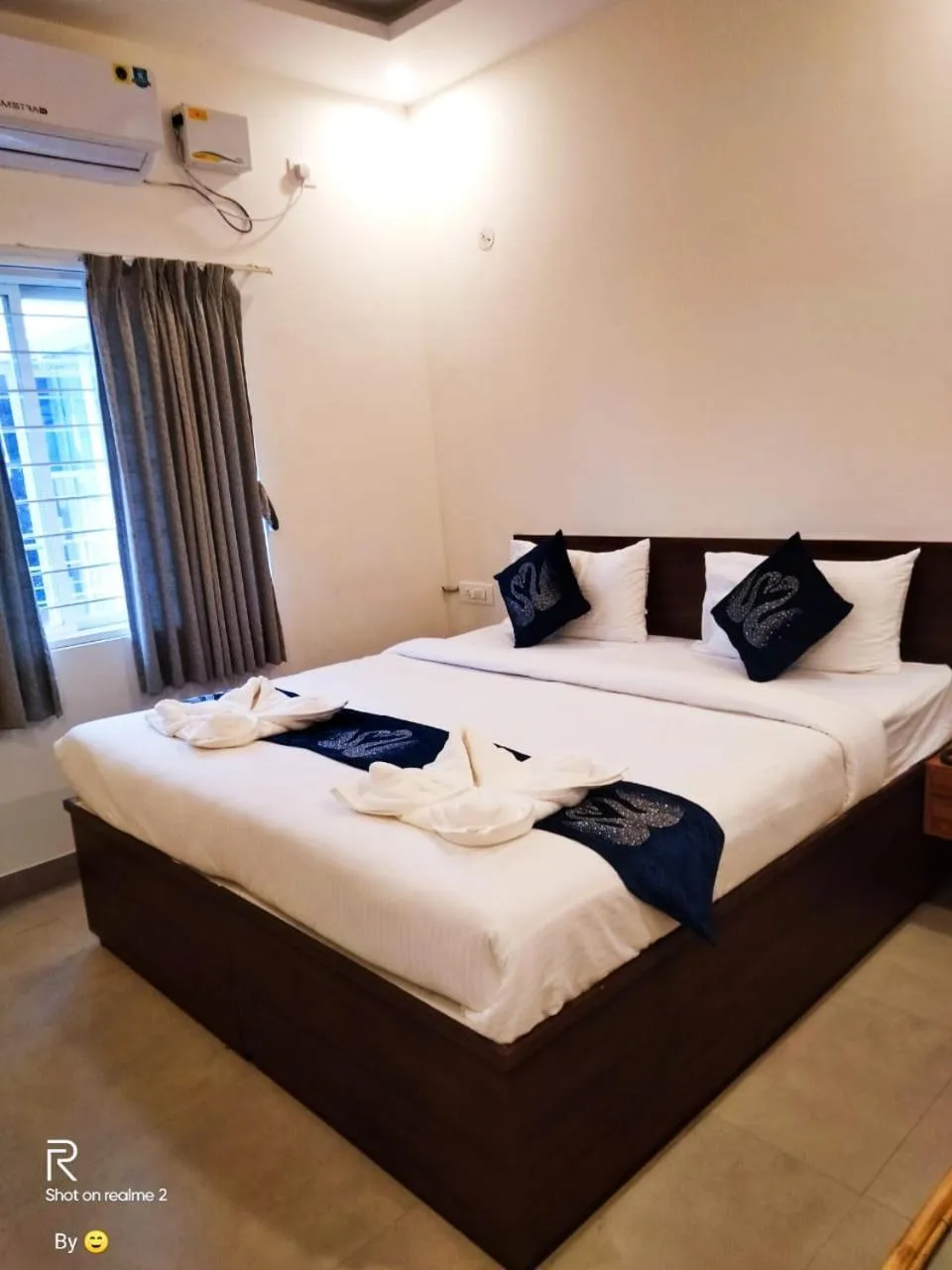 Bed in Hotel Amulya Fine Dine