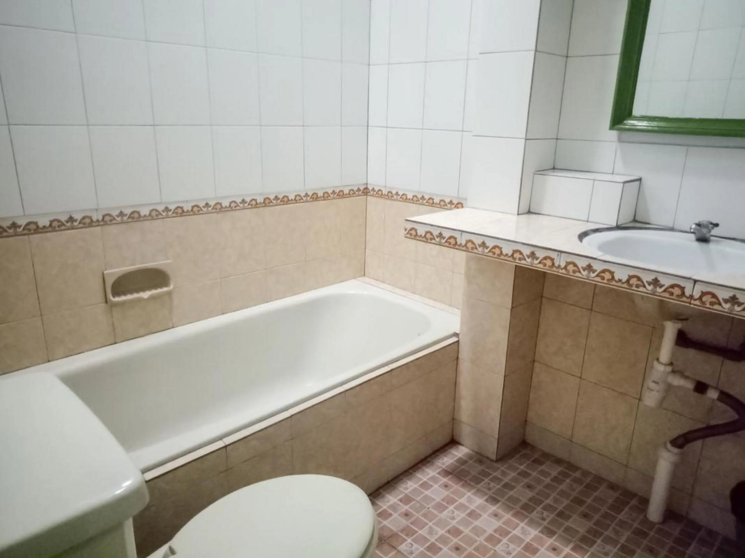 Bathroom in DATON HOUSE near Bali Zoo Ubud Mitra RedDoorz