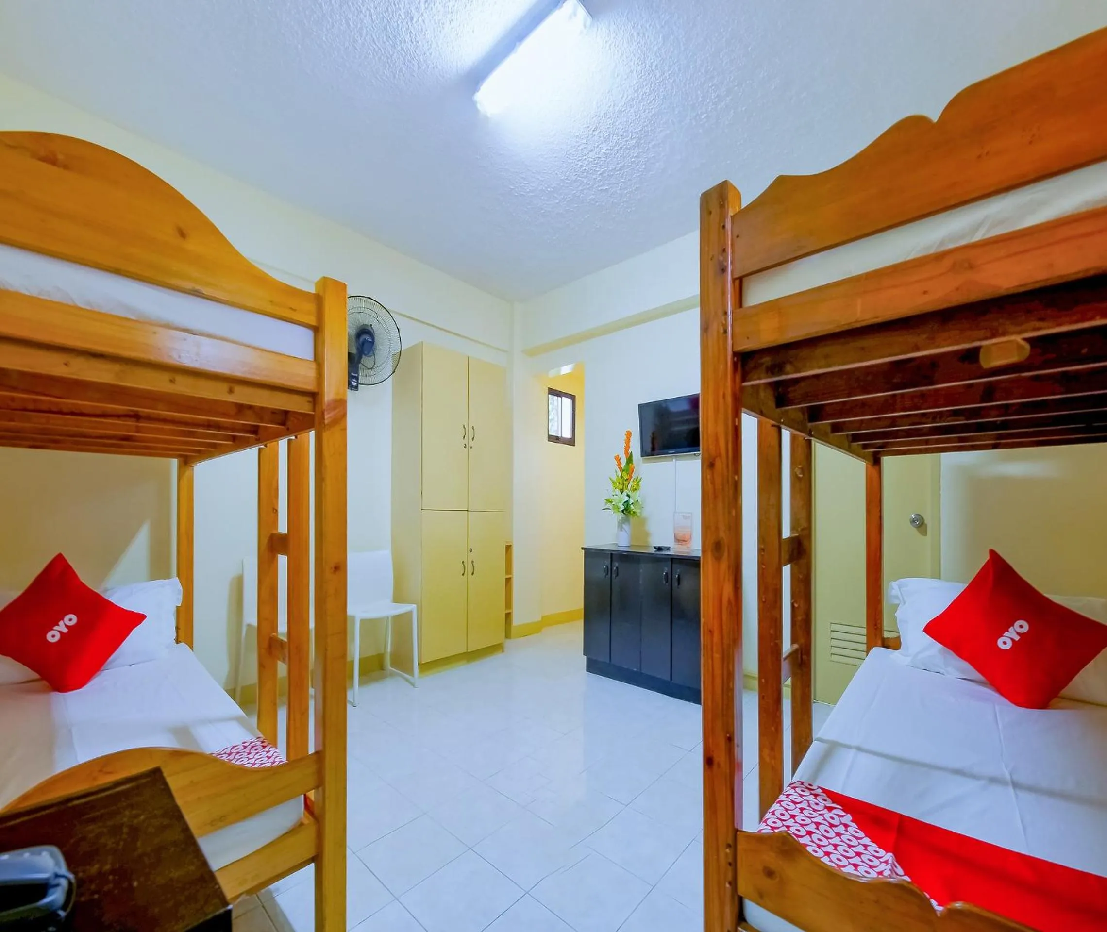 Bedroom in OYO 840 Orangenest Apartelle