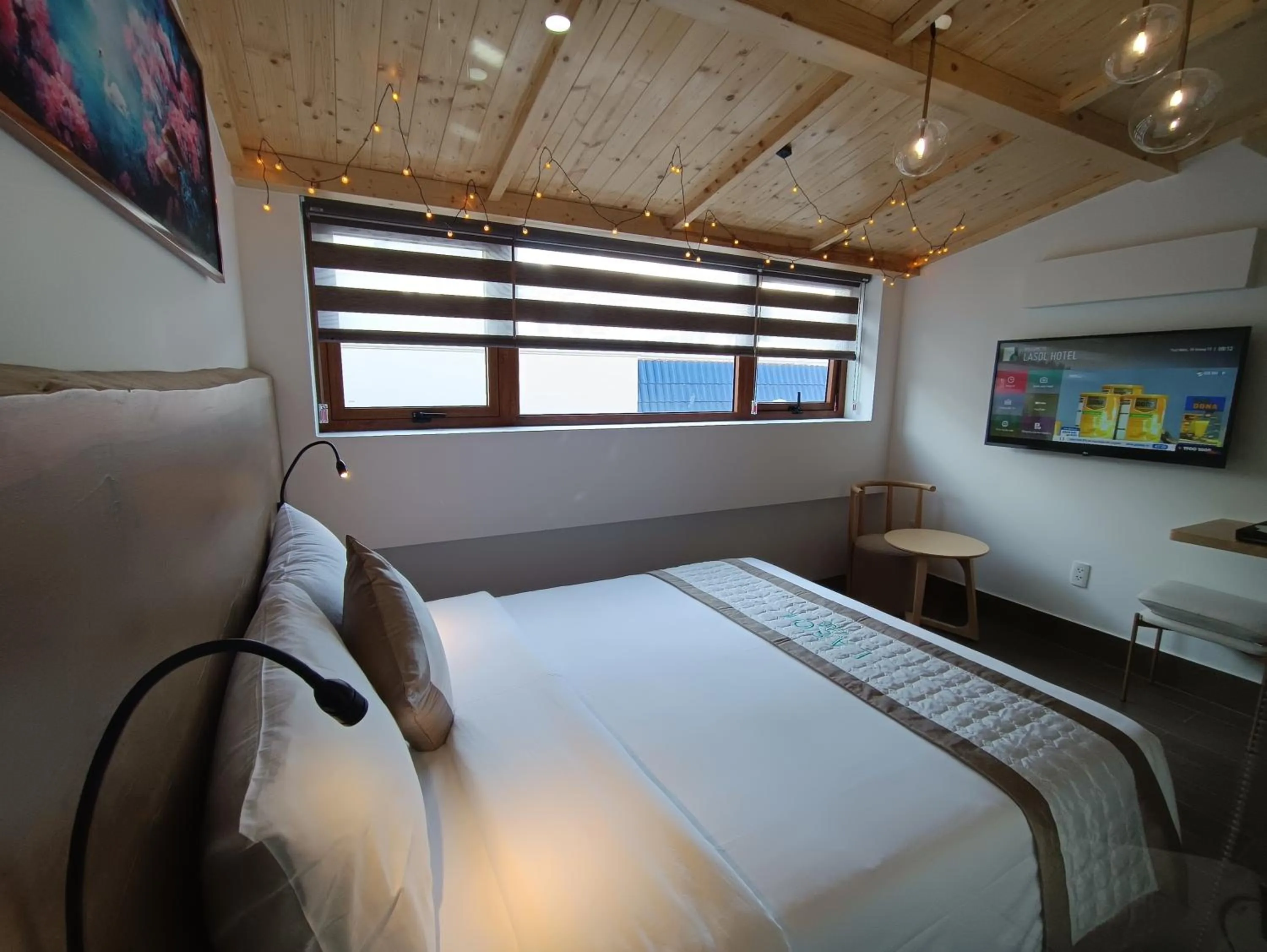 Bed in Lasol Boutique Hotel