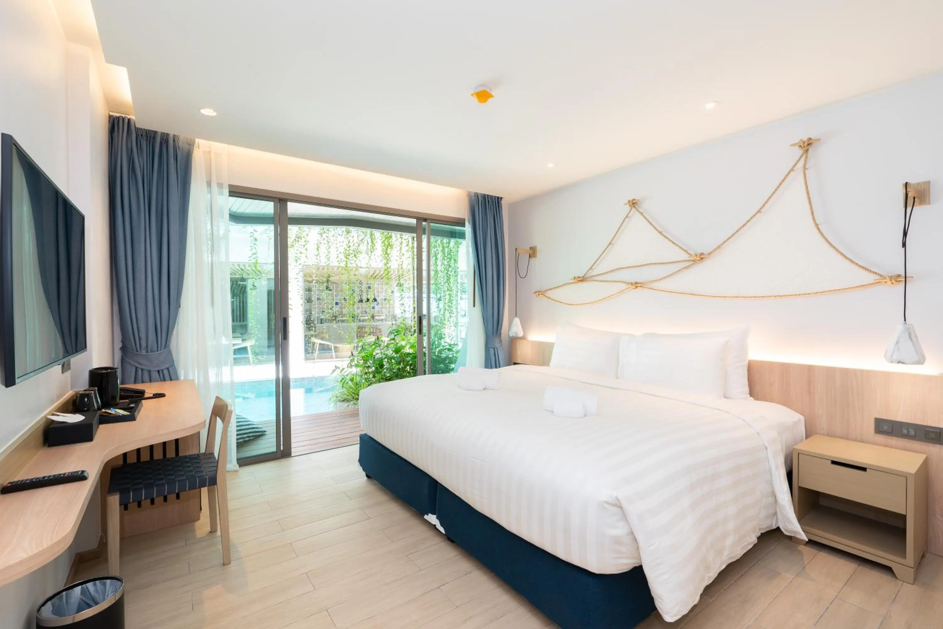 Bed in Panwaburi Beachfront Resort - SHA Extra Plus