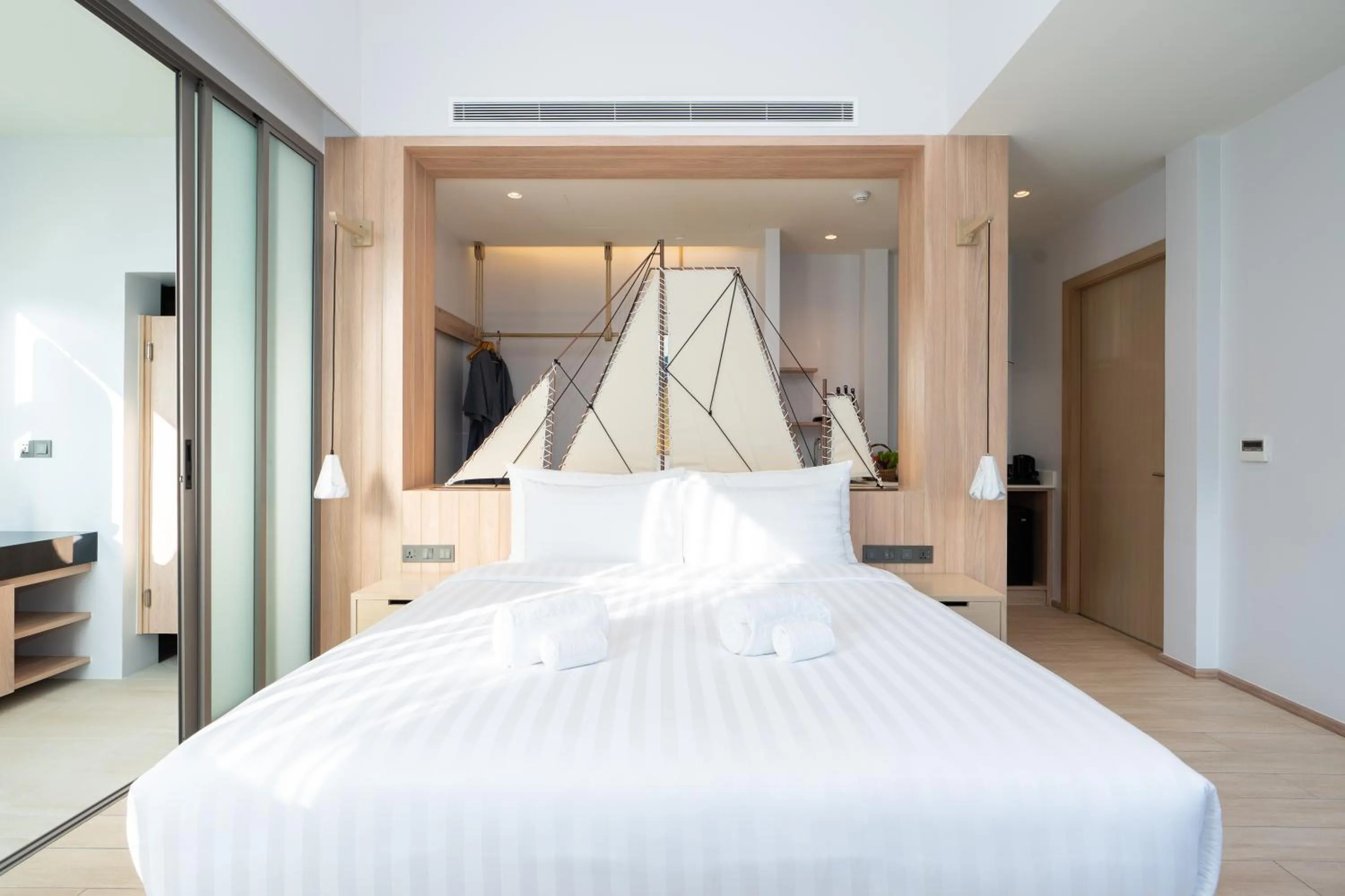 Bed in Panwaburi Beachfront Resort - SHA Extra Plus