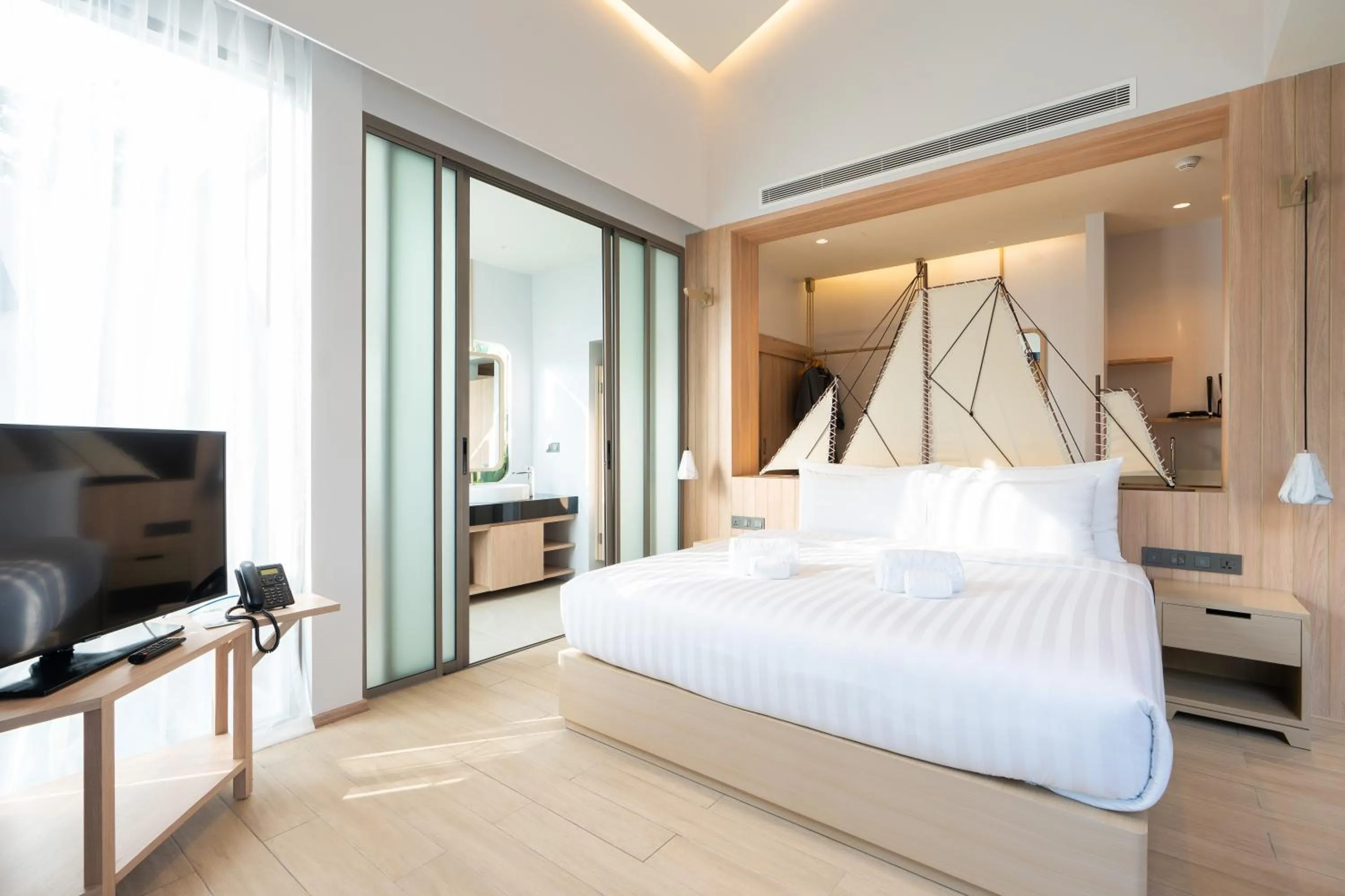 Bed in Panwaburi Beachfront Resort - SHA Extra Plus