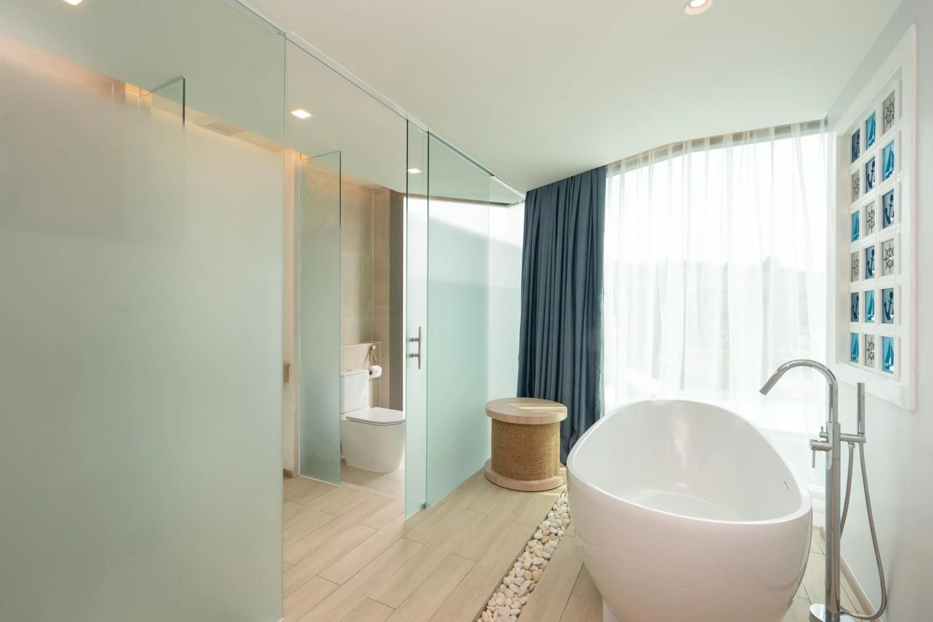 Bathroom in Panwaburi Beachfront Resort - SHA Extra Plus
