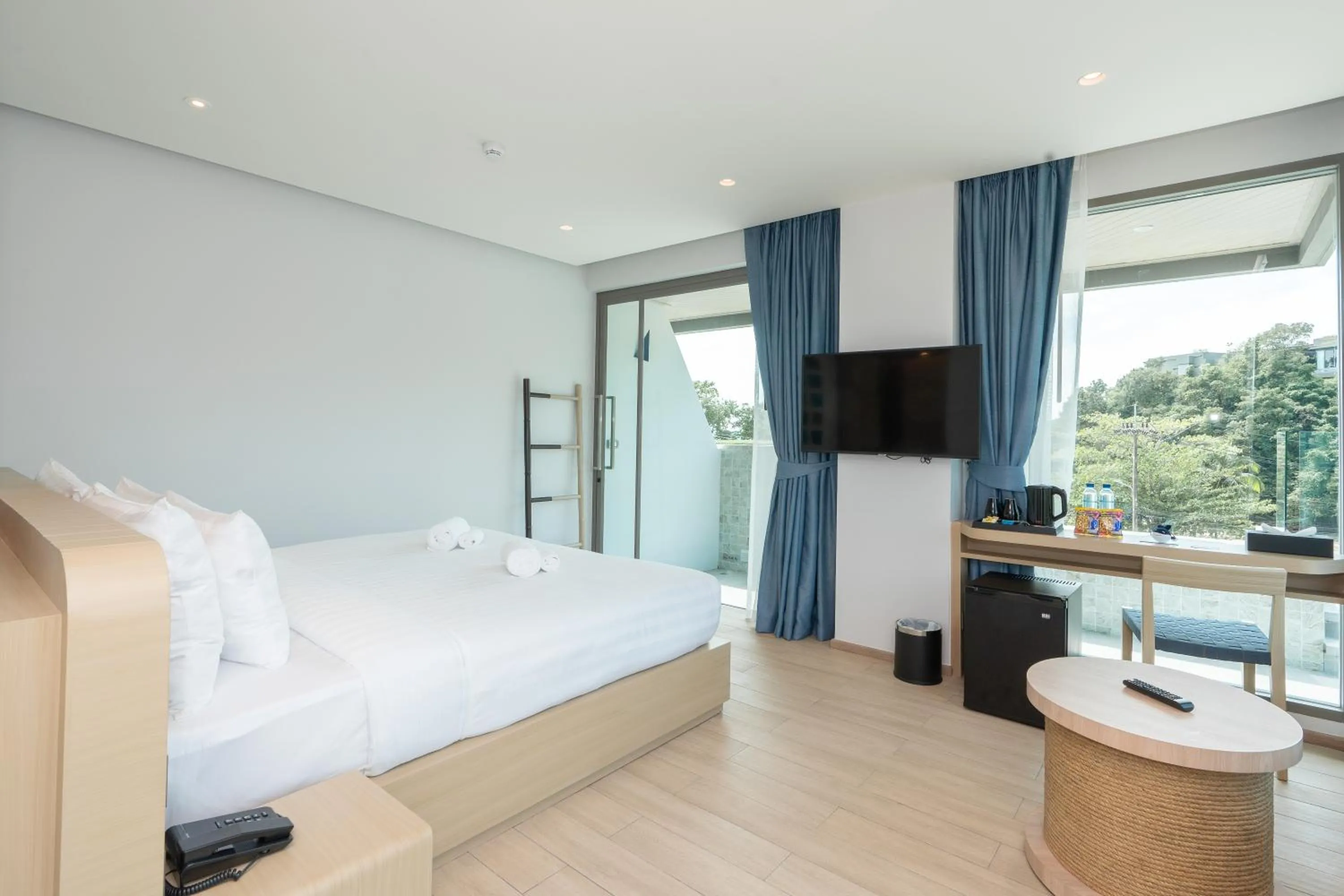 Photo of the whole room, Bed in Panwaburi Beachfront Resort - SHA Extra Plus