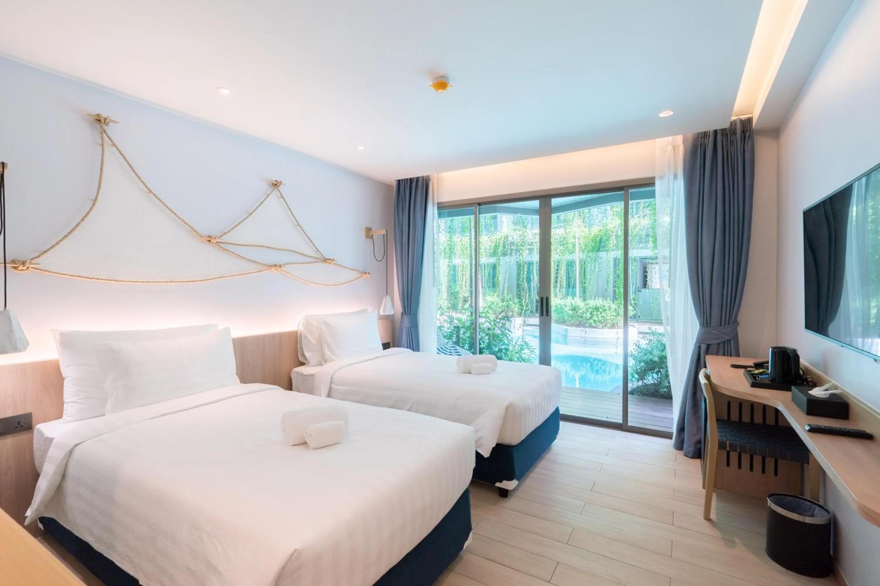Photo of the whole room, Bed in Panwaburi Beachfront Resort - SHA Extra Plus