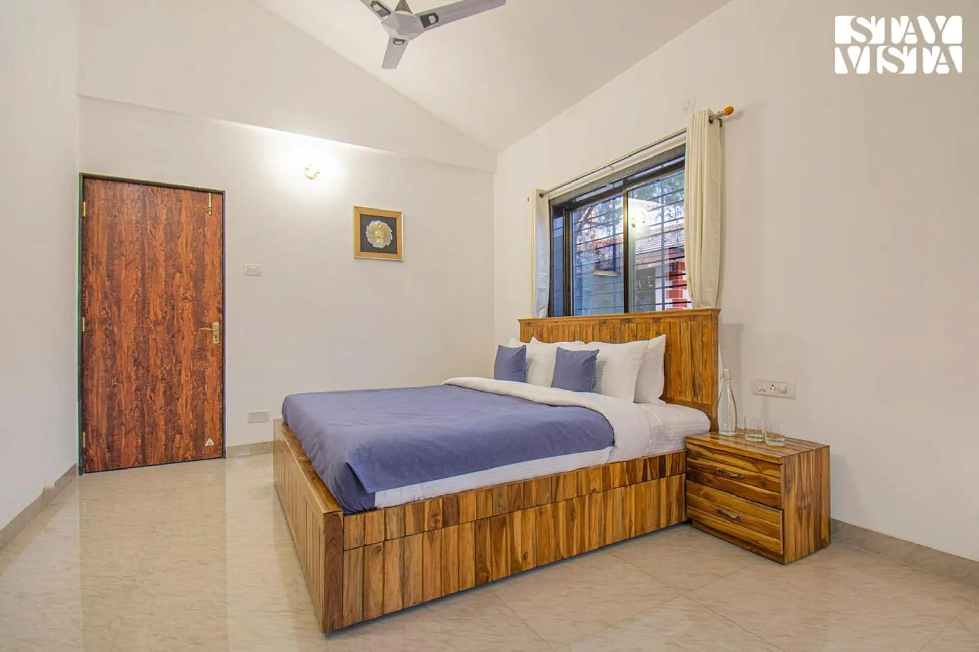 Bedroom, Bed in StayVista's Brookvale Cottage - Dive into tranquility with pool view and gazebo
