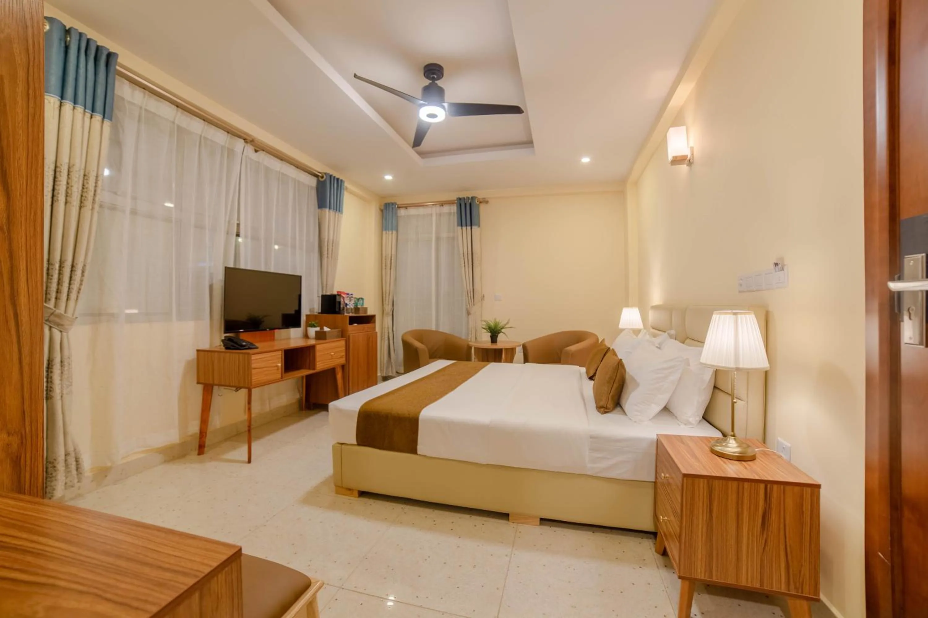 TV and multimedia, Bed in Amber Beach Hotel