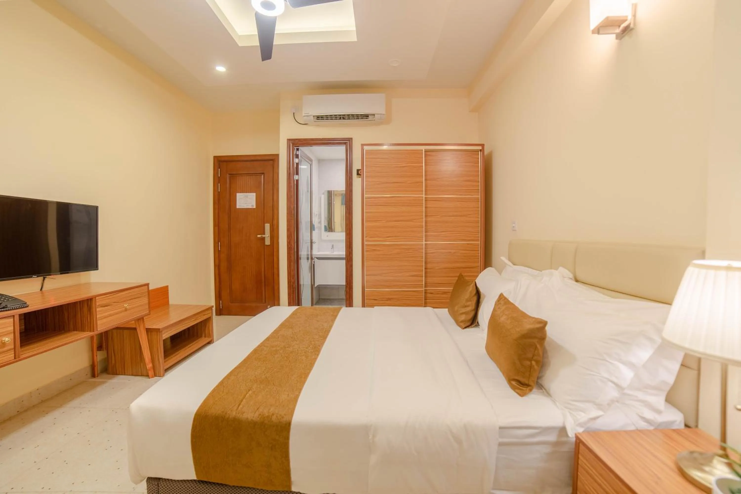 TV and multimedia, Bed in Amber Beach Hotel