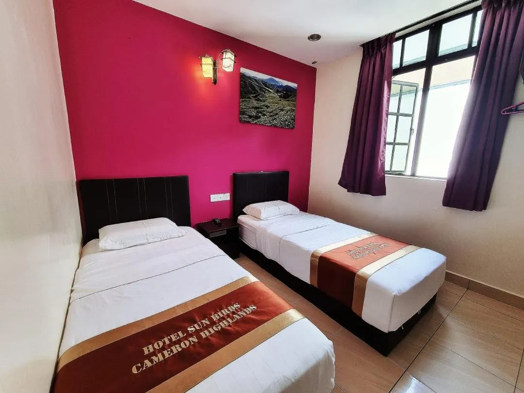 Bed in Hotel Sun Birds