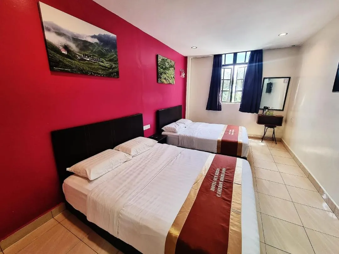 Bed in Hotel Sun Birds