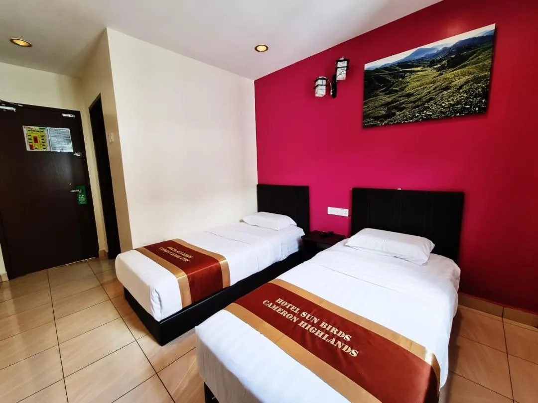 Bed in Hotel Sun Birds