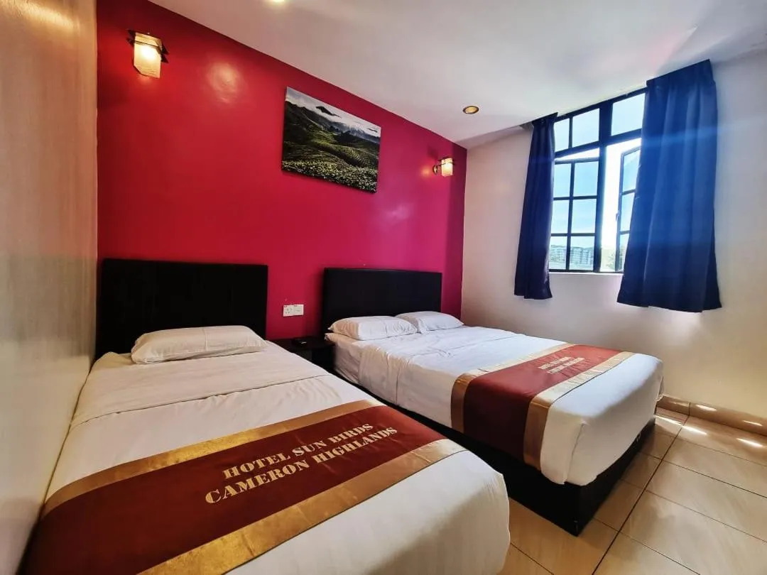 Bed in Hotel Sun Birds