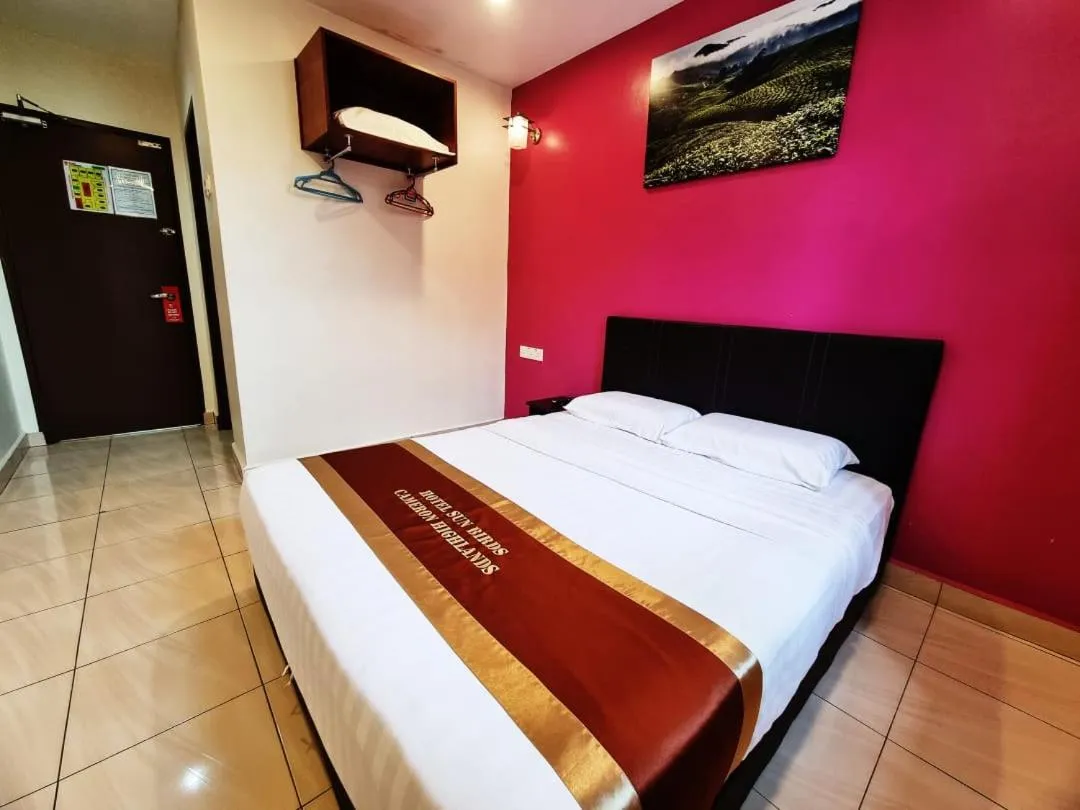 Bed in Hotel Sun Birds