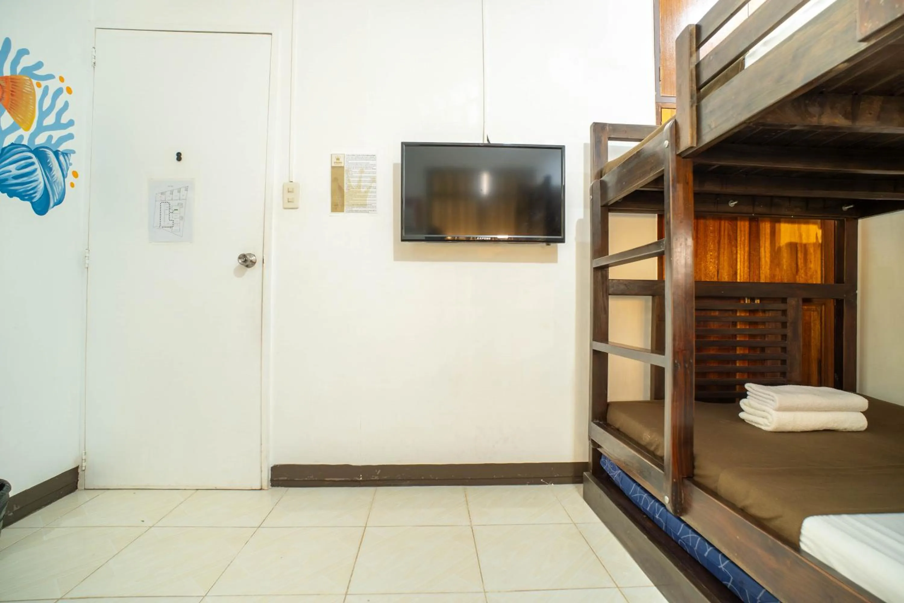 Bed in Prim Travellers Inn