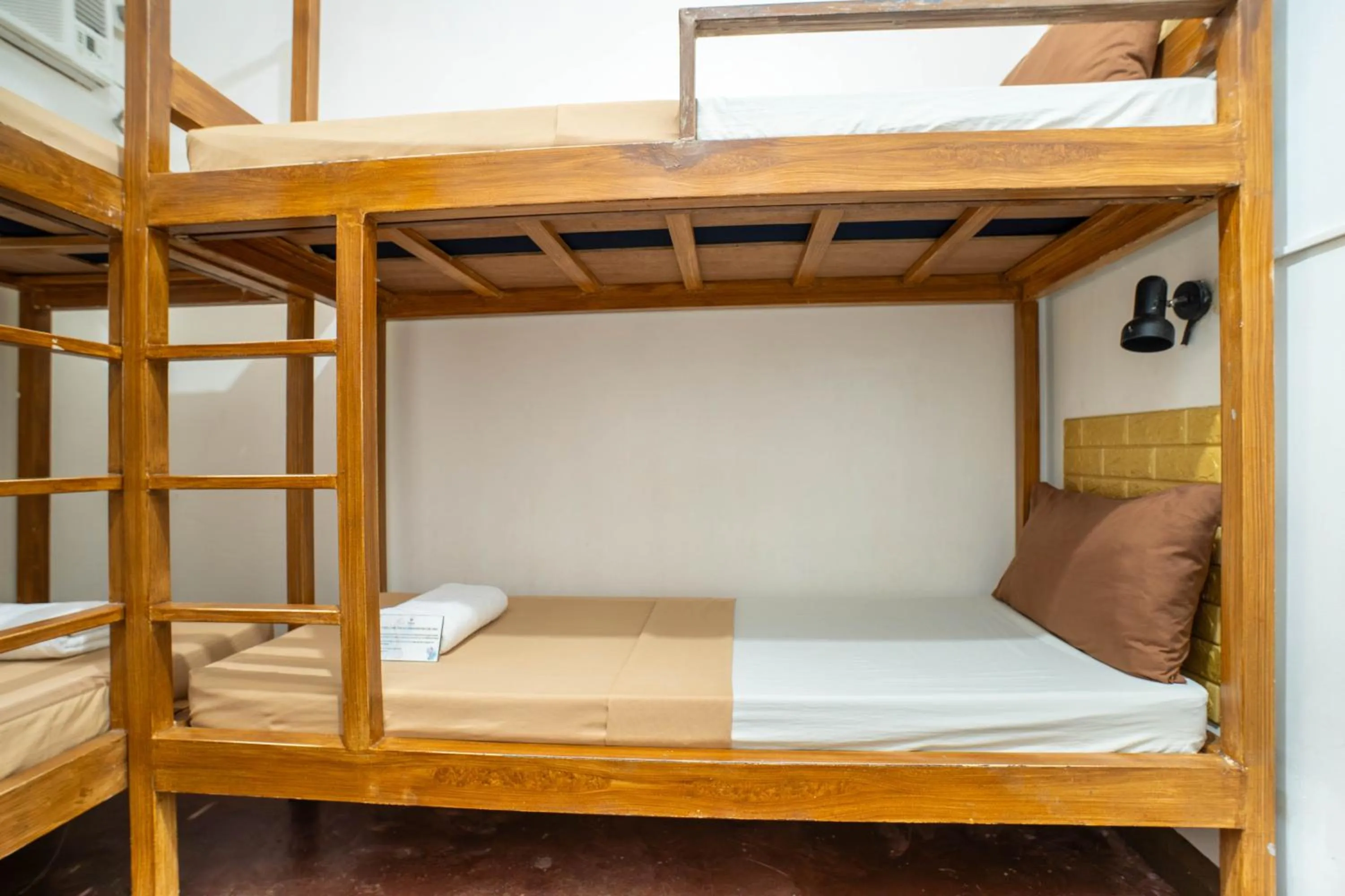 Bed in Prim Travellers Inn