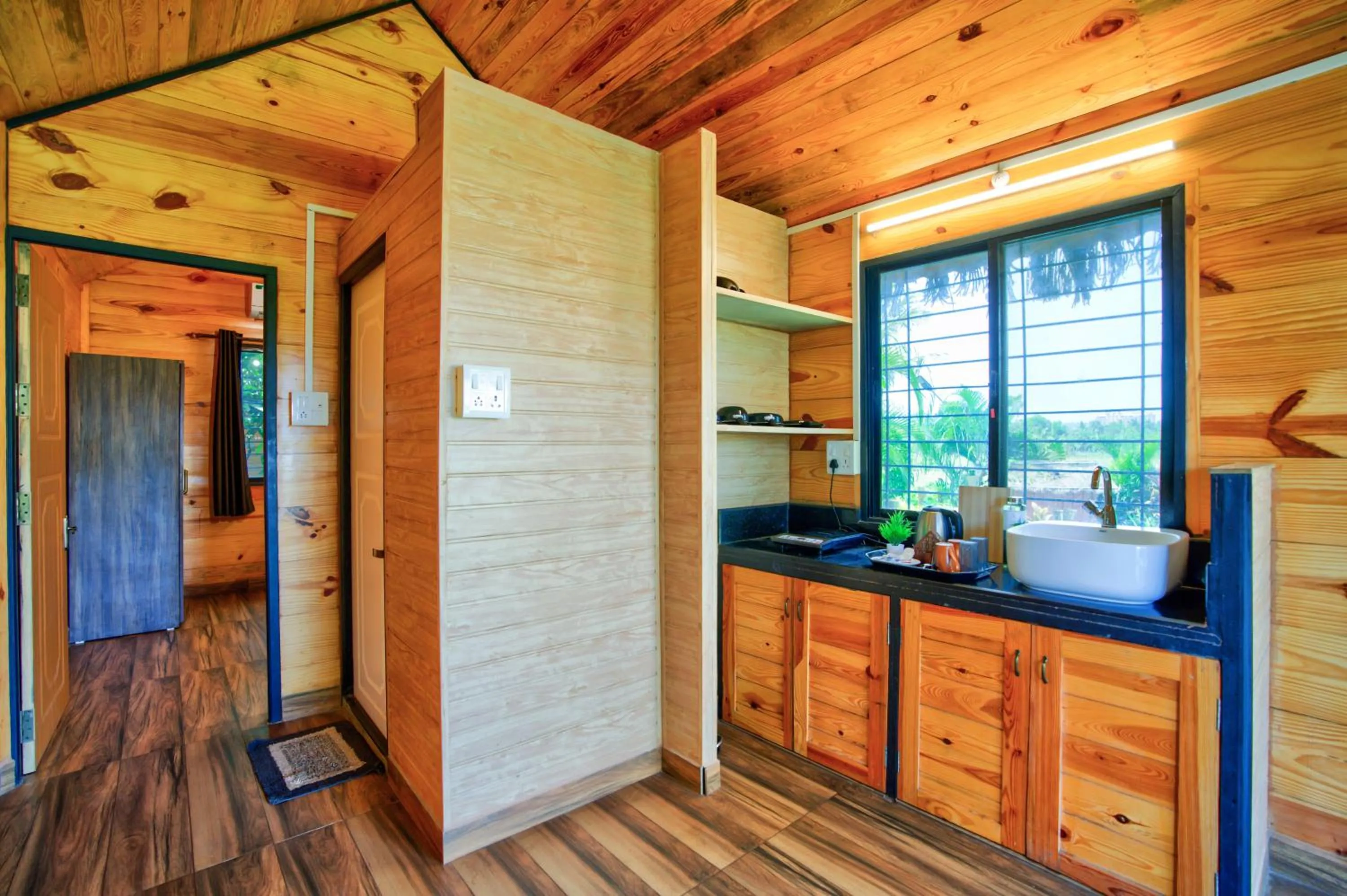 Kitchen or kitchenette in The Lazy Cabanas