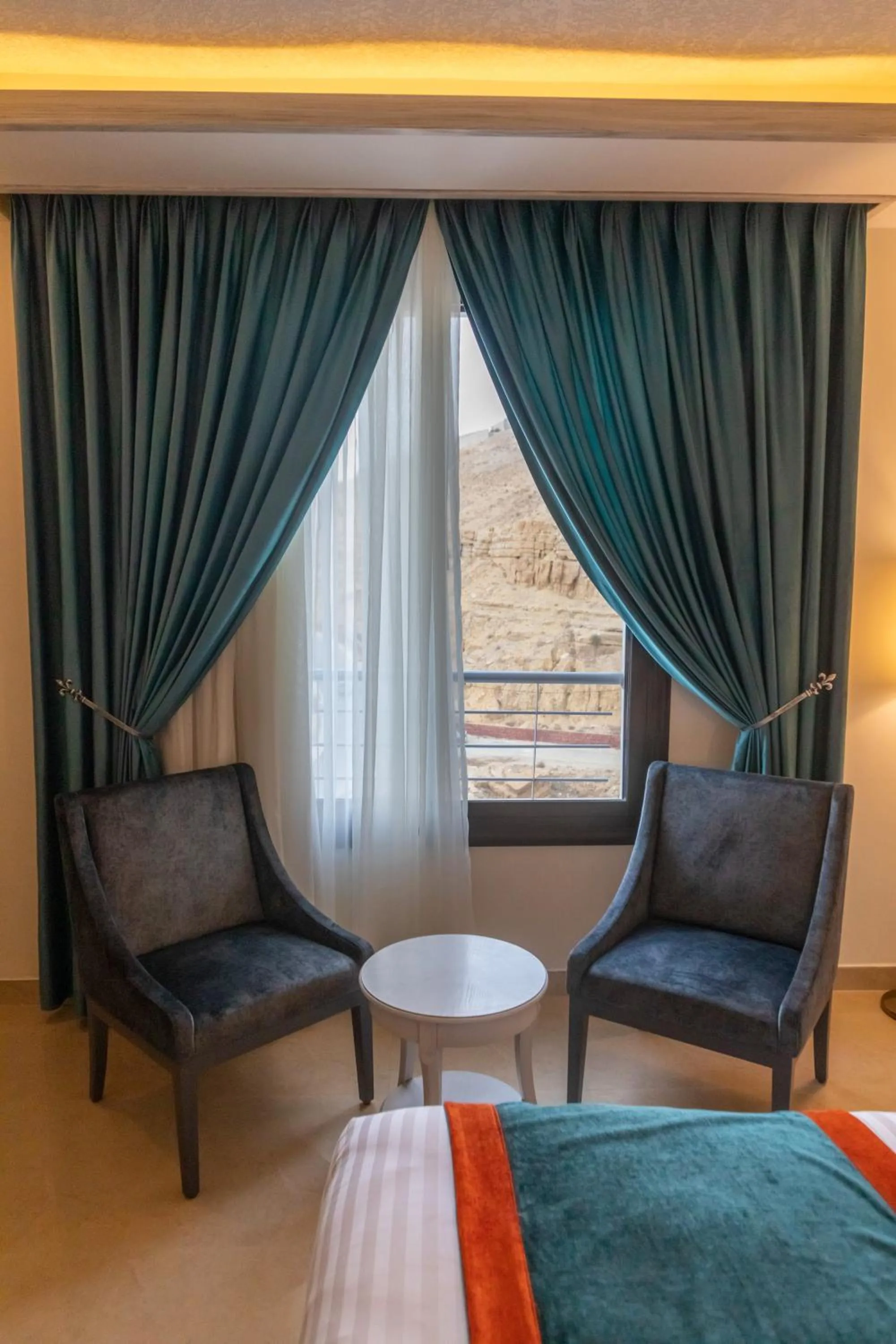 Bed in Petra Canyon Hotel