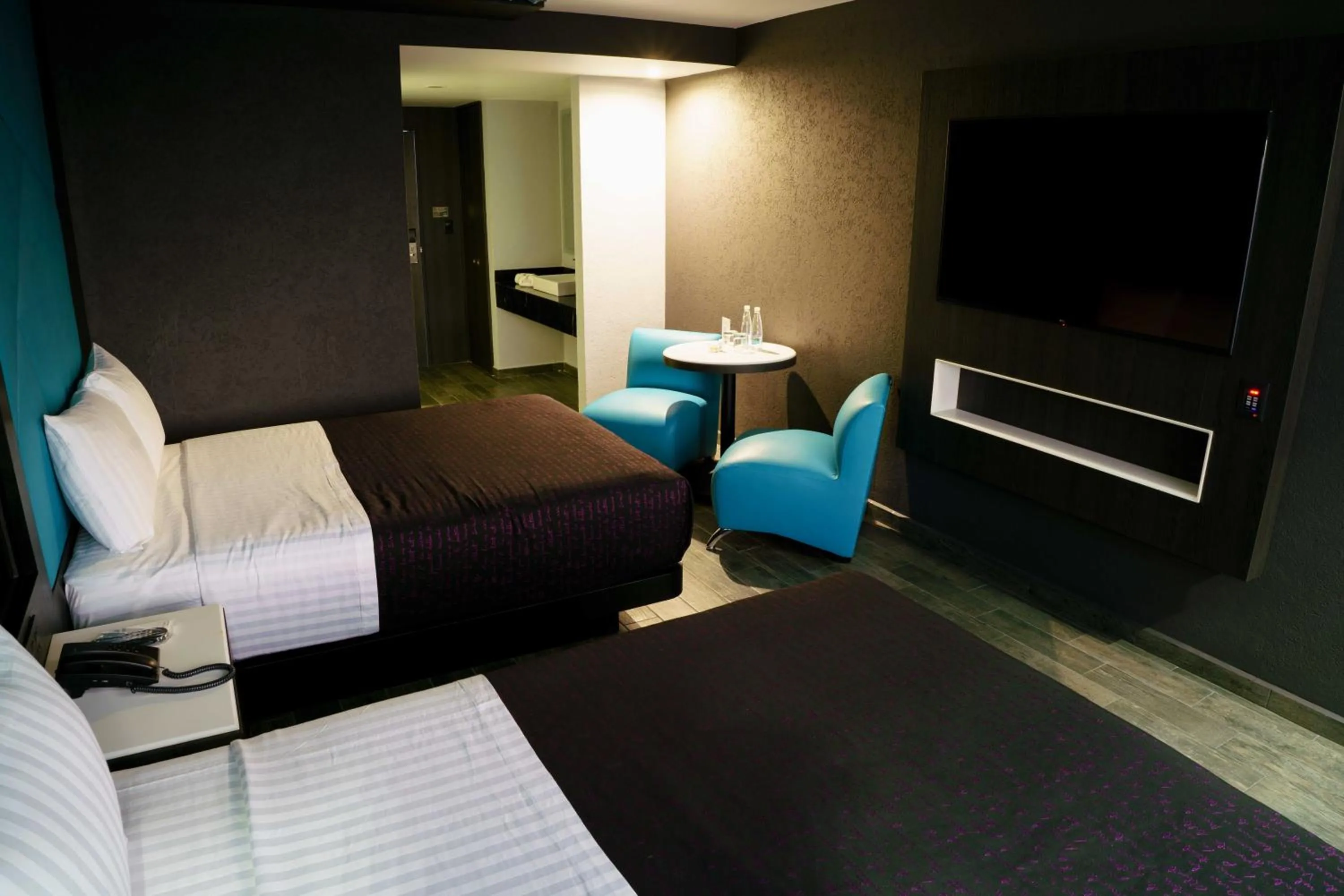 Photo of the whole room, Bed in HOTEL PASSION SECRETS VILLAS AND SUITES