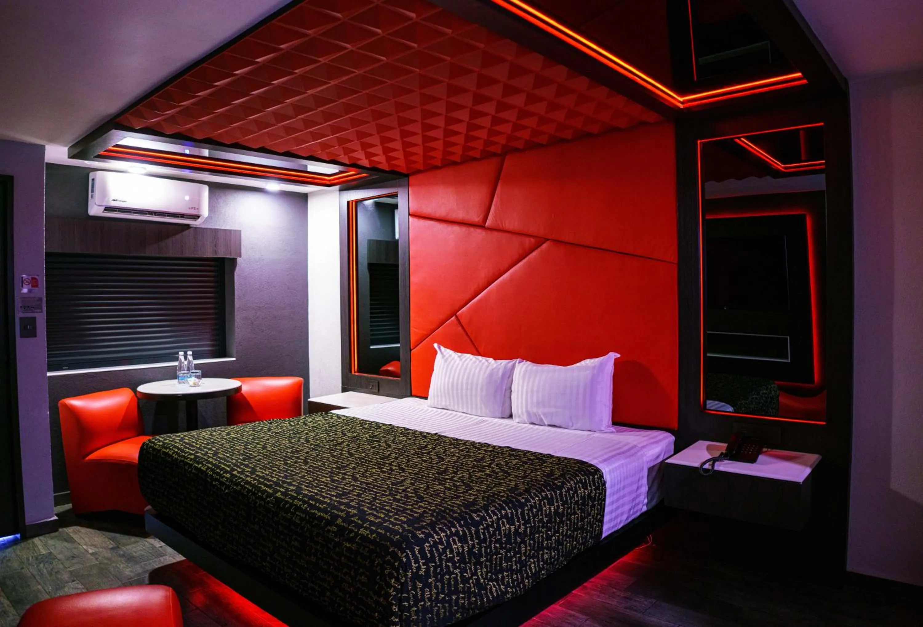 Bed in HOTEL PASSION SECRETS VILLAS AND SUITES