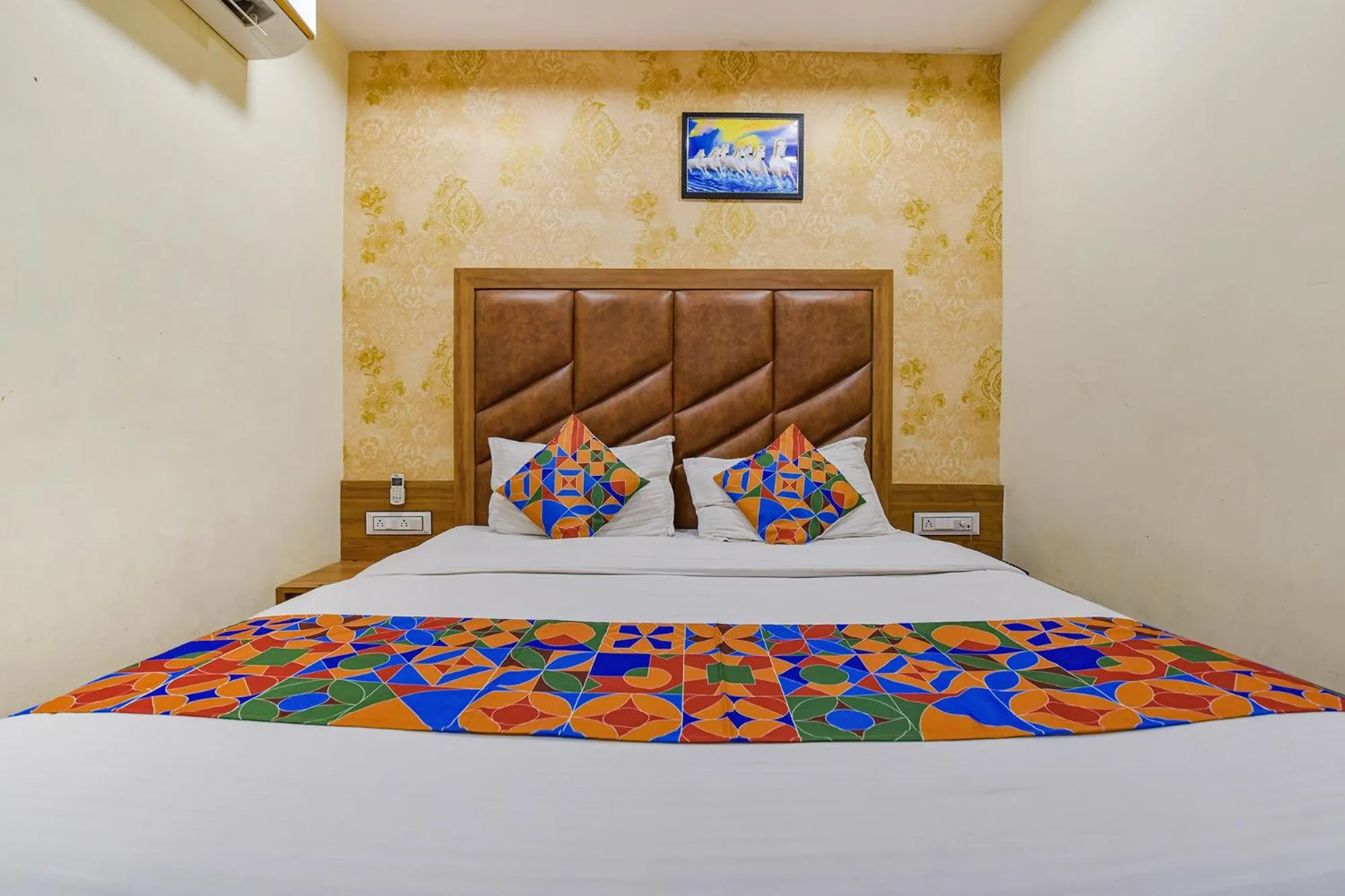 Bed in FabHotel Silver Inn